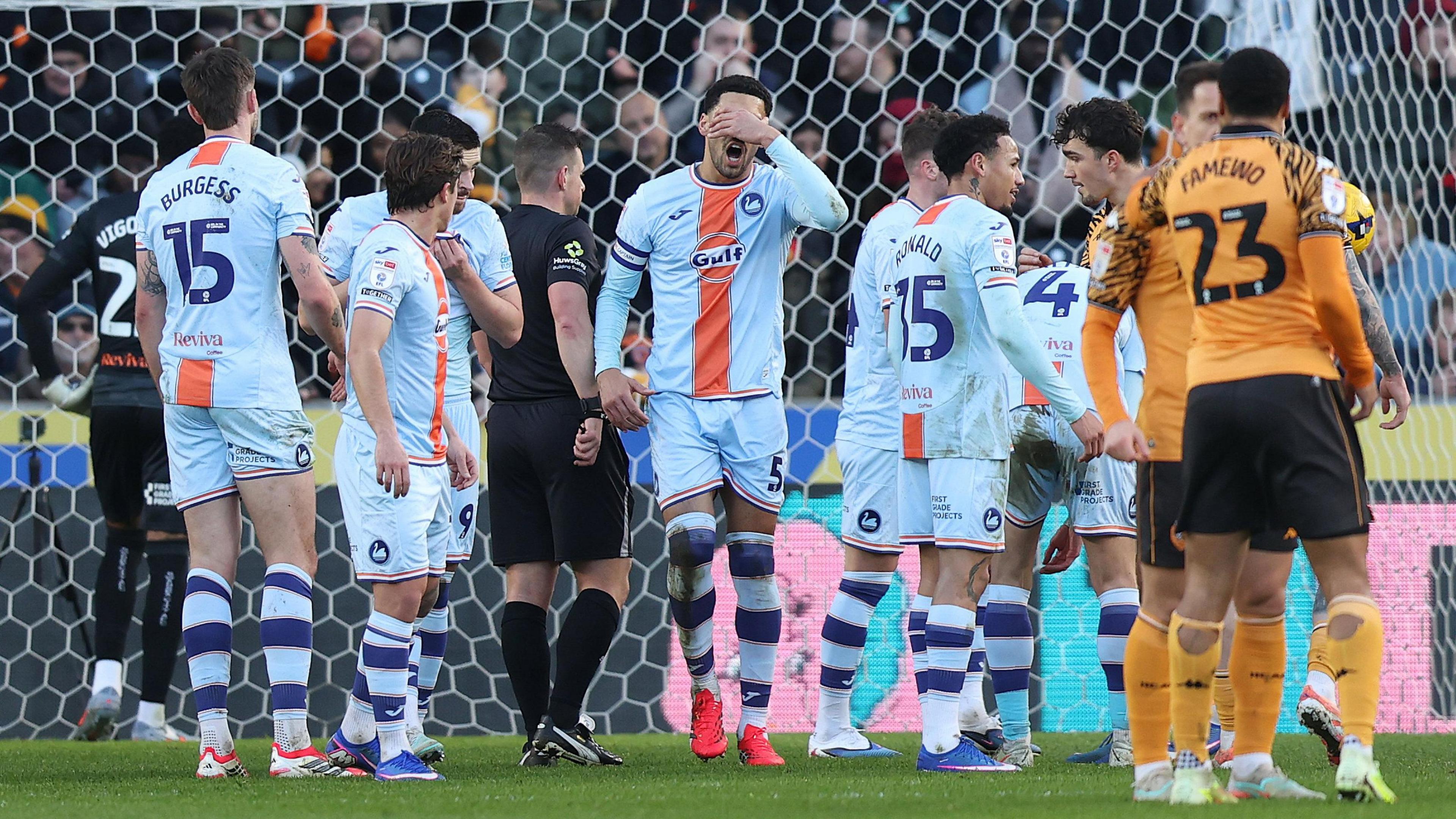 Ben Cabango shows his disappointment after giving away a penalty