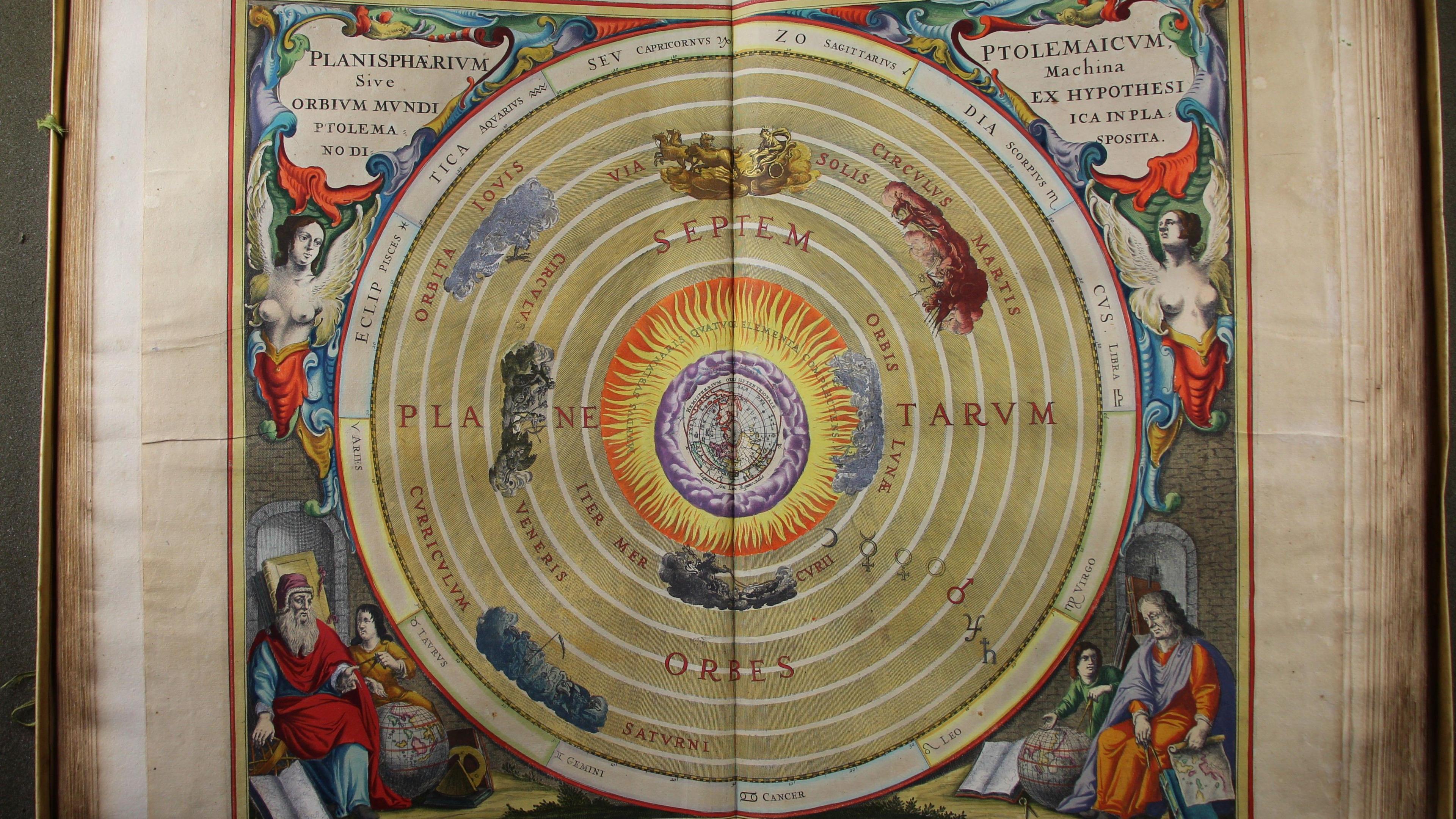 An elaborate and colourful double page illustration of planets in a circular pattern, with Latin descriptions and depictions of biblical and celestial figures in the corners.