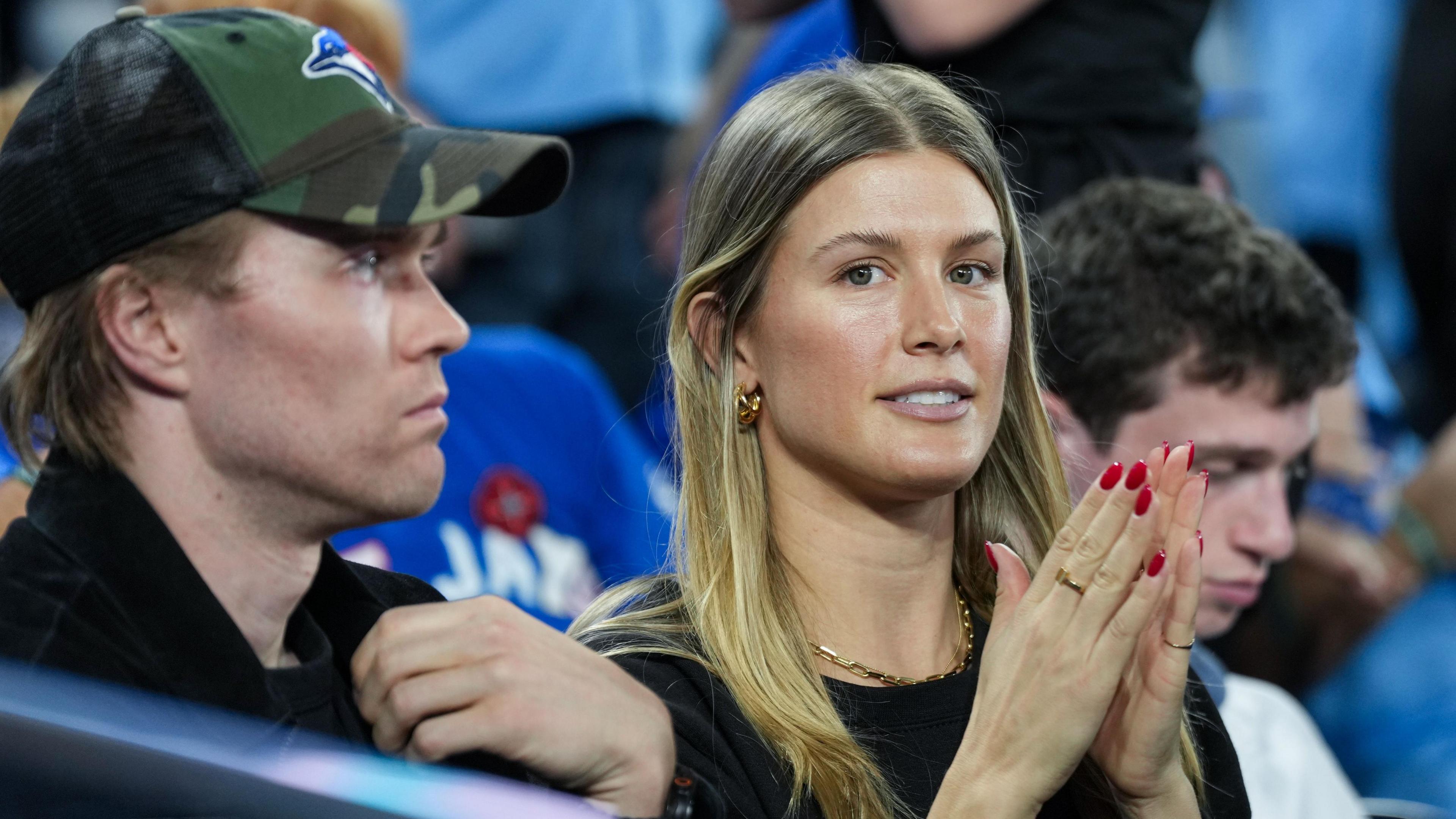 Former tennis player Eugenie Bouchard watches game seven at the Rogers Centre
