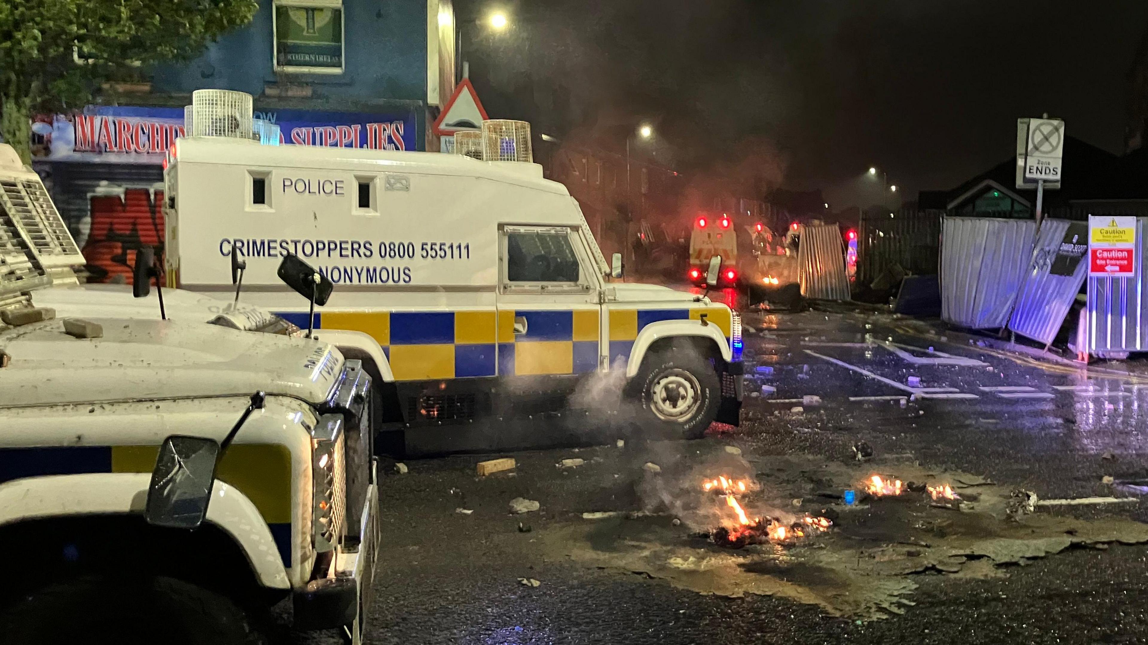 Sandy Row with police land rovers during disturbances 