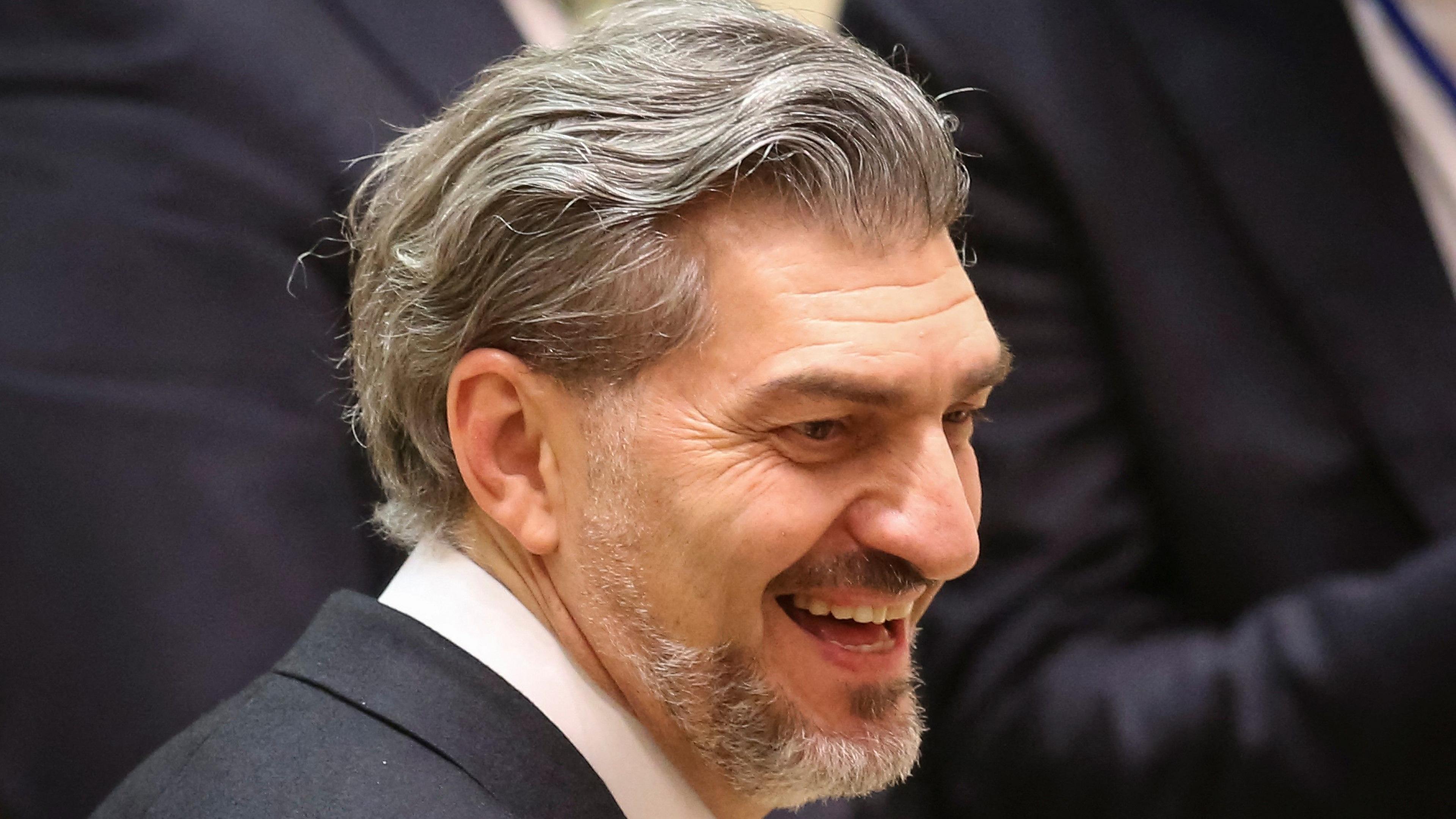 Mikheil Kavelashvili smiles after he was elected the country's new president in the parliament, in Tbilisi, Georgia on 14 December