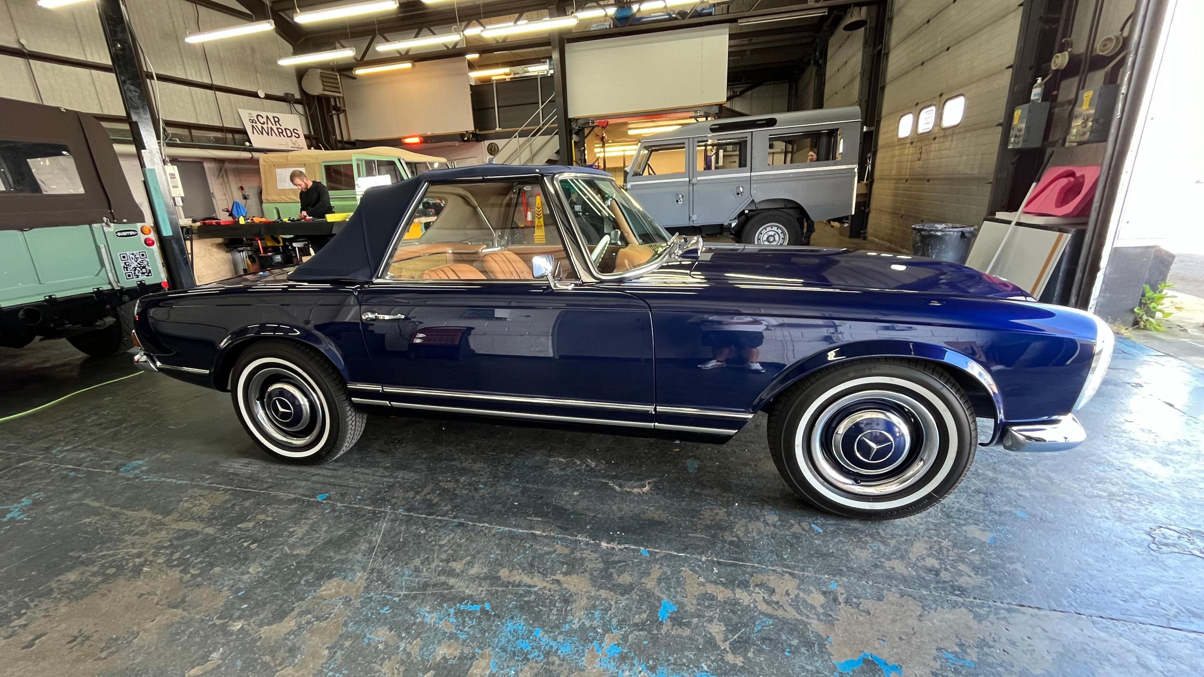 Classic blue Mercedes Pagoda in Upper Heyford workshop