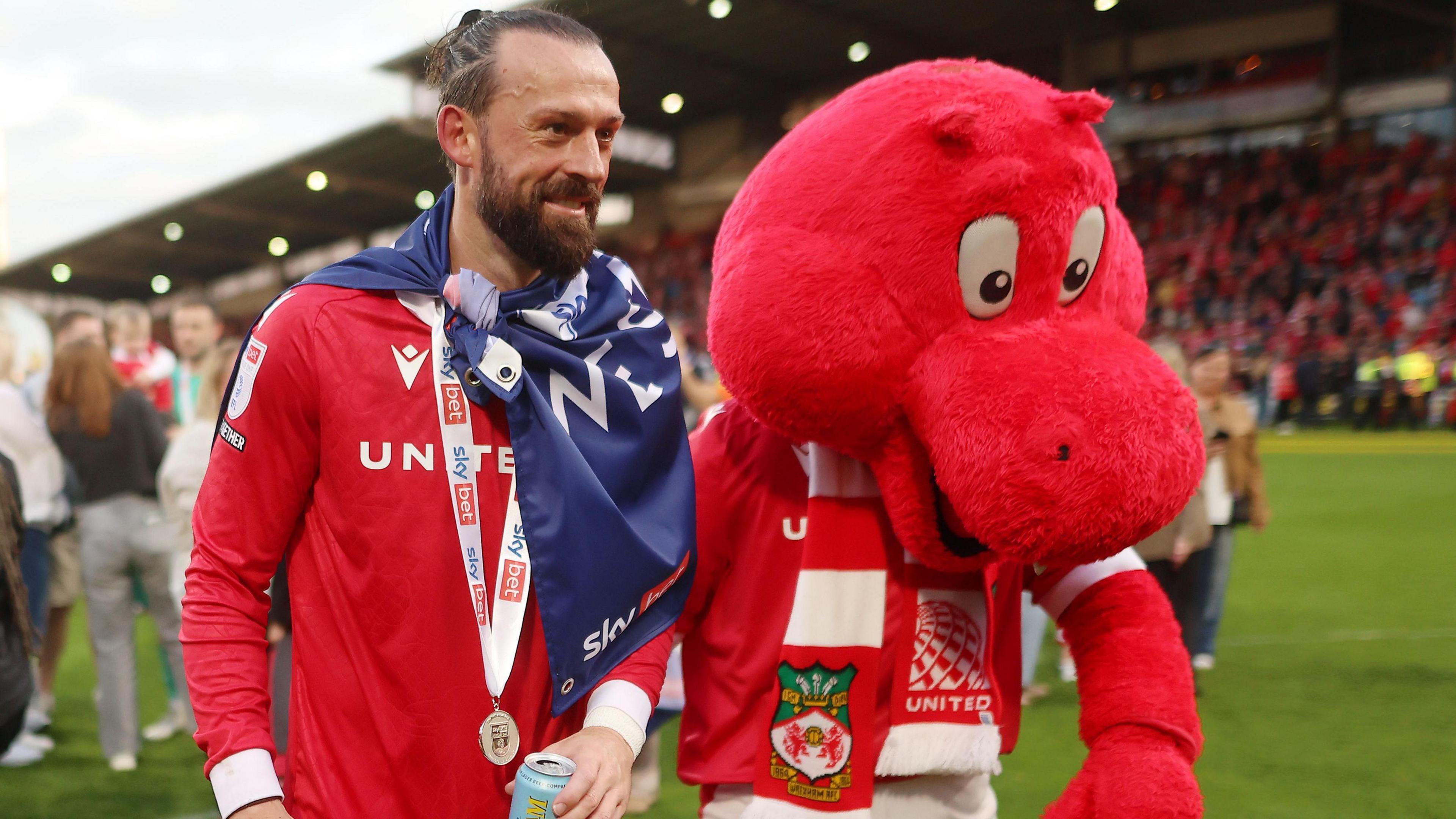 Steven Fletcher and Wrexham's Red Dragon mascot
