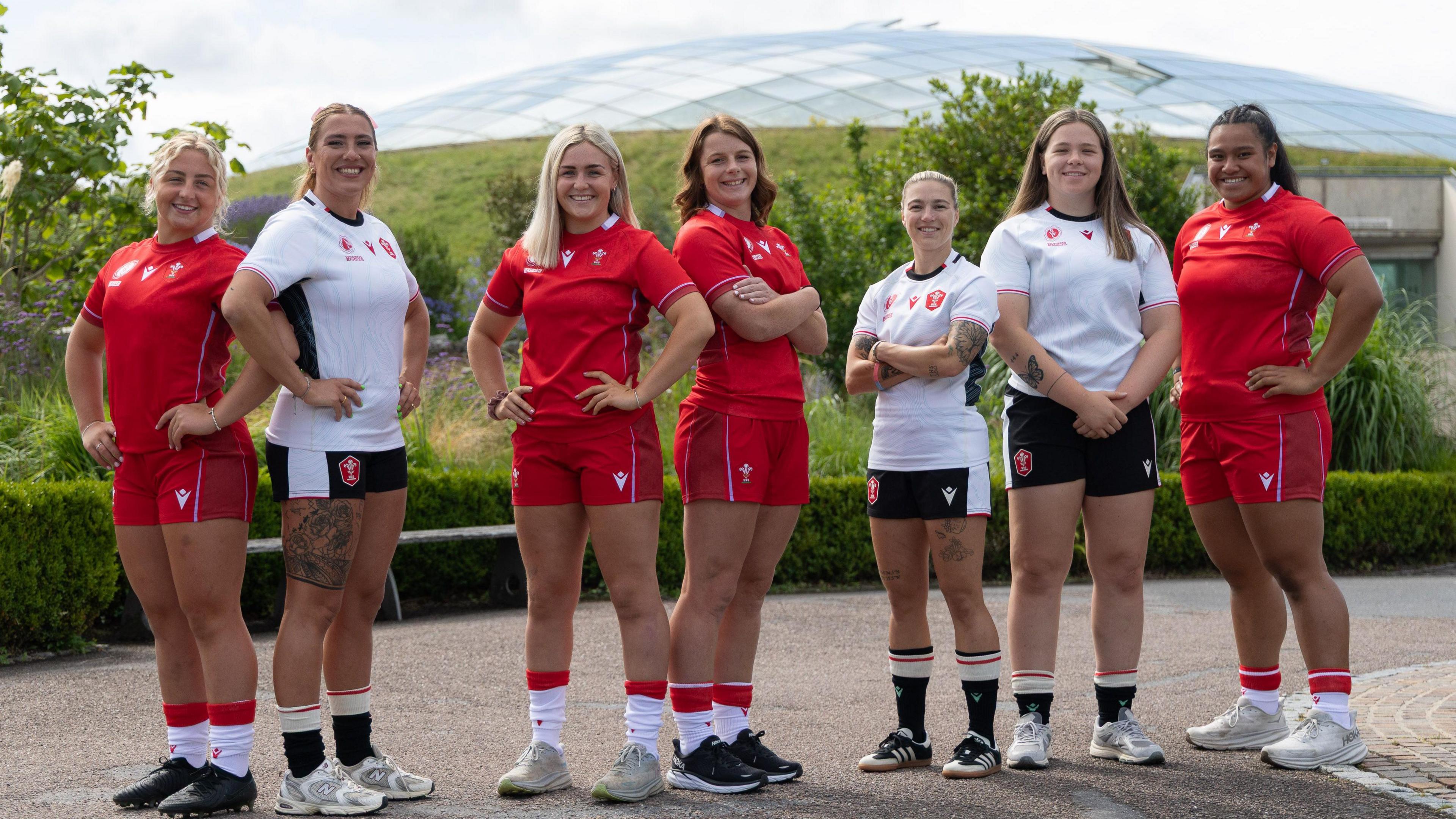 Wales players unveiling their kit for the Rugby World Cup at the National Botanic Garden of Wales
L-R Molly Reardon, Georgia Evans, Alex Callender, Kate Williams, Keira Bevan, Maisie Davies and Sisilia Tuipulotu