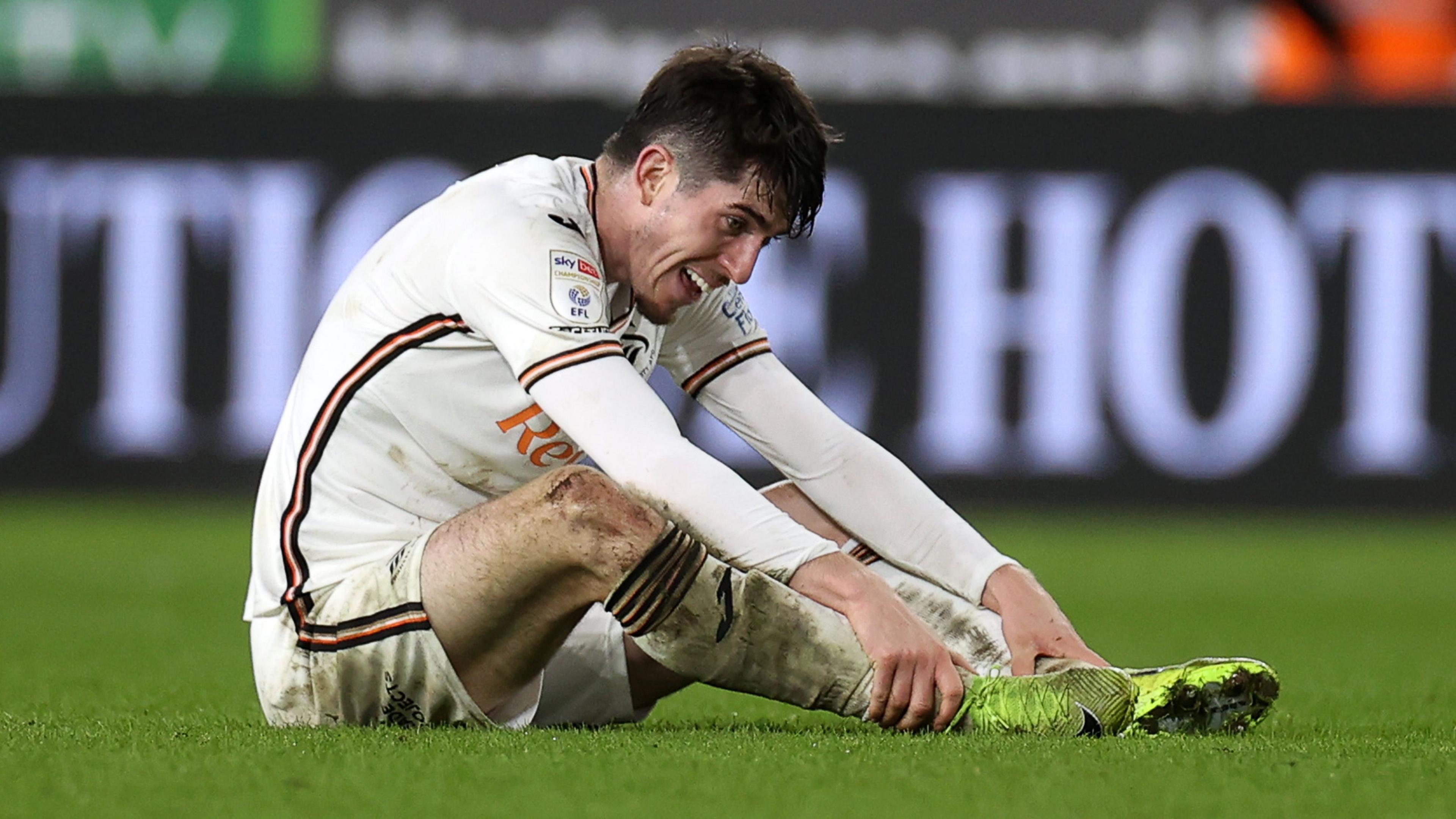 Swansea City right-back Josh Key looks dejected