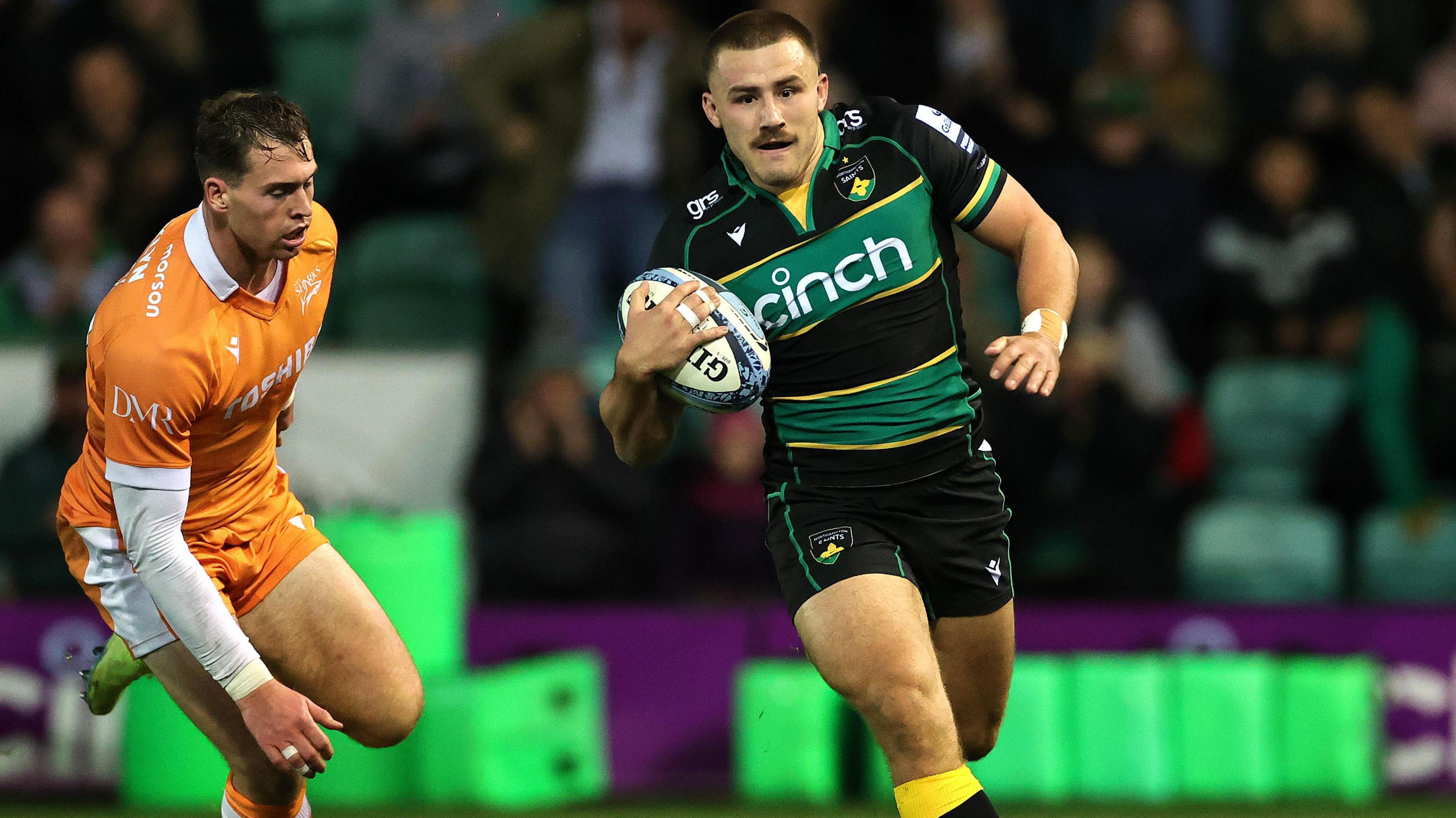 Ollie Sleightholme runs in for a try for Northampton against Sale Sharks