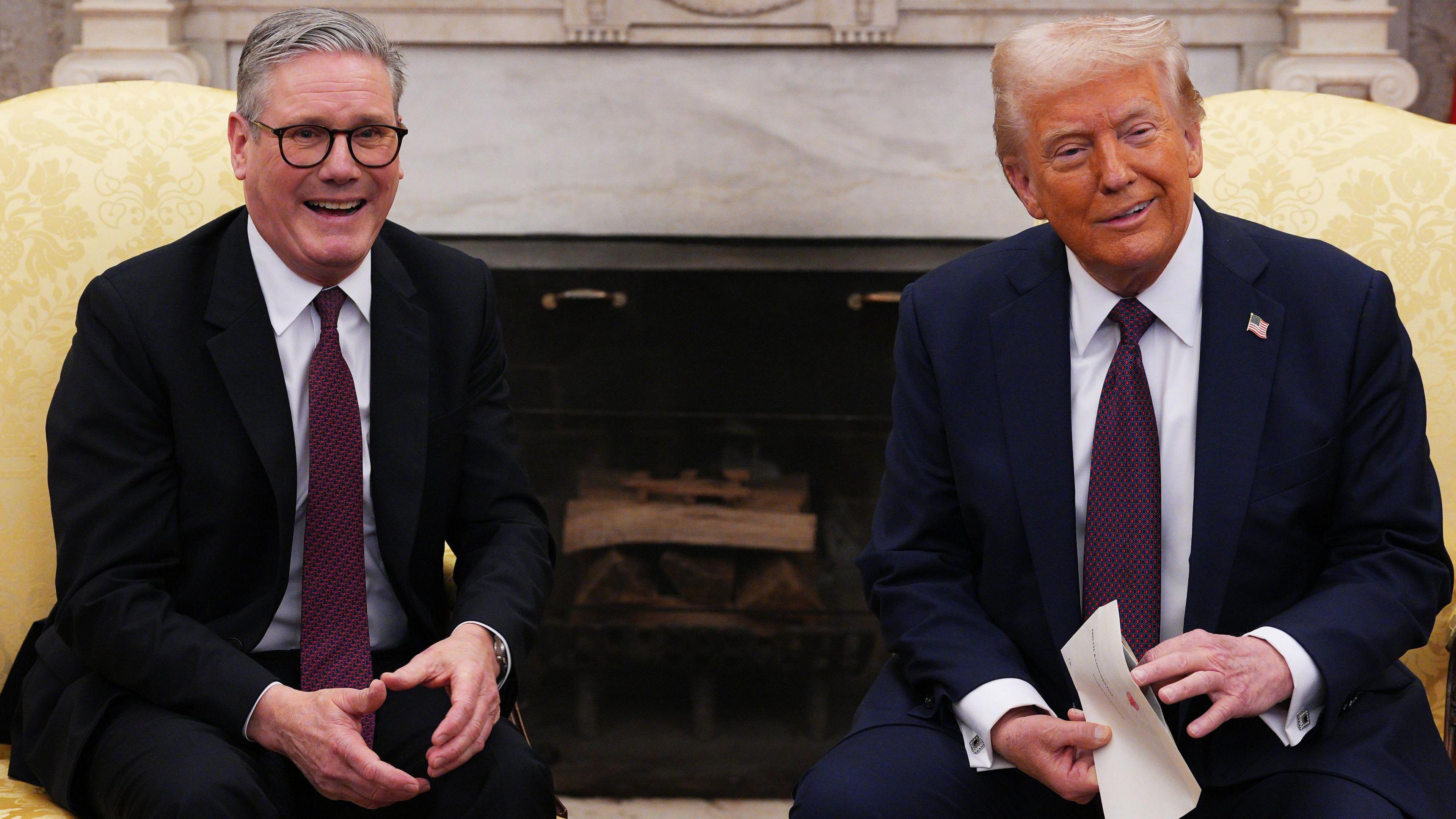 Keir Starmer and Donald Trump sitting in the Oval Office. 