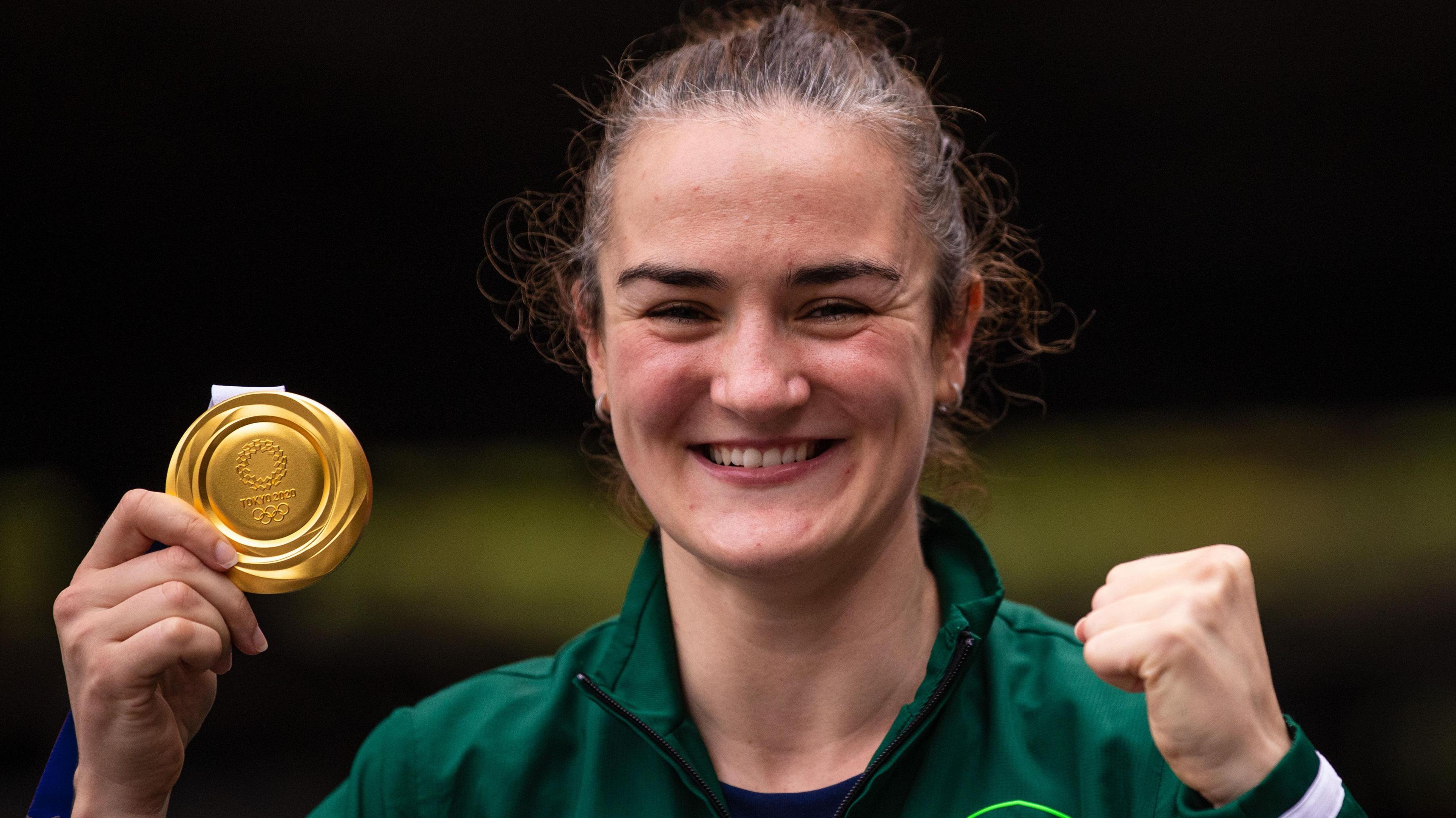 Kellie Harrington celebrates winning a gold medal