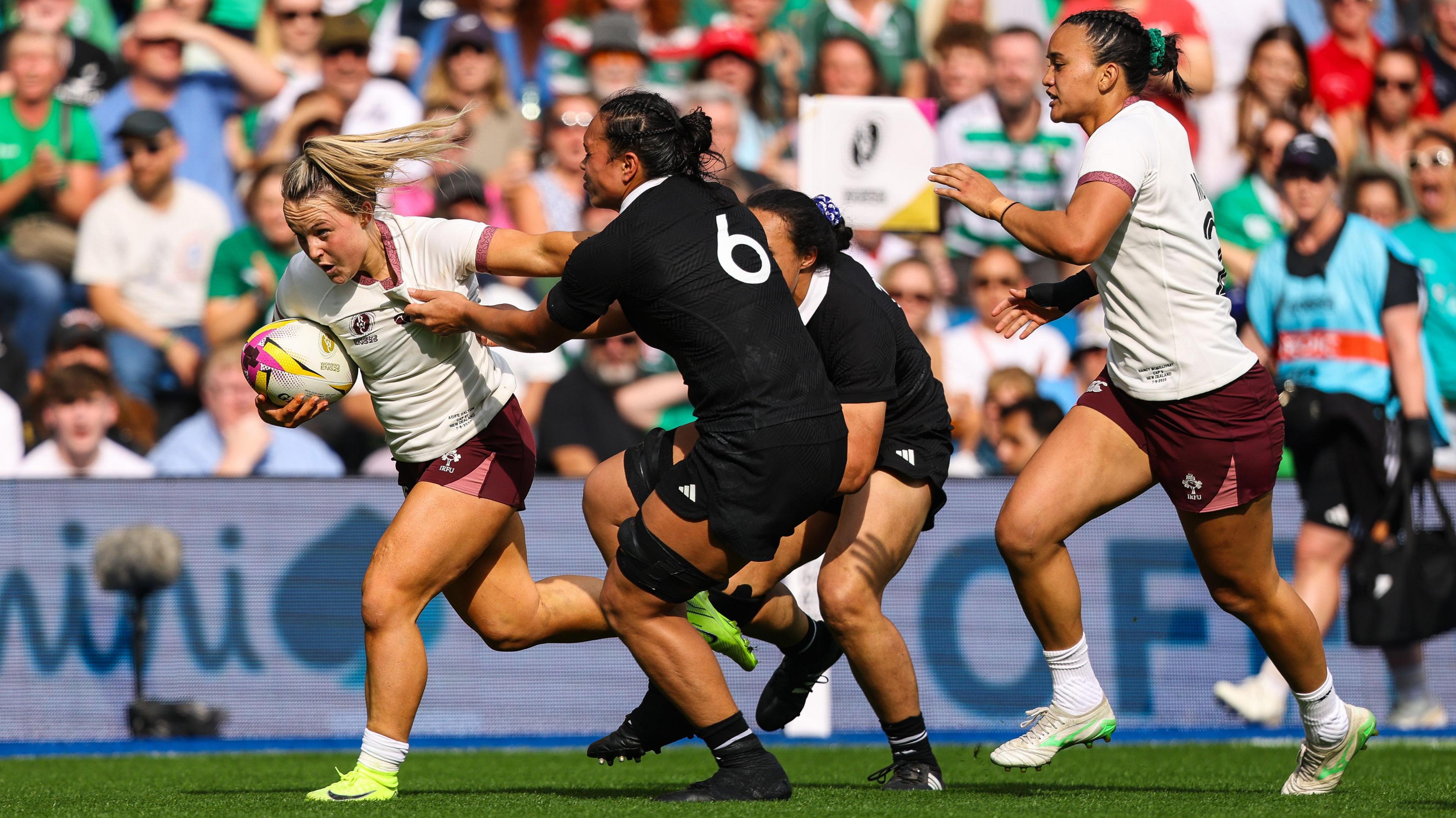 Aoife Dalton runs with the ball