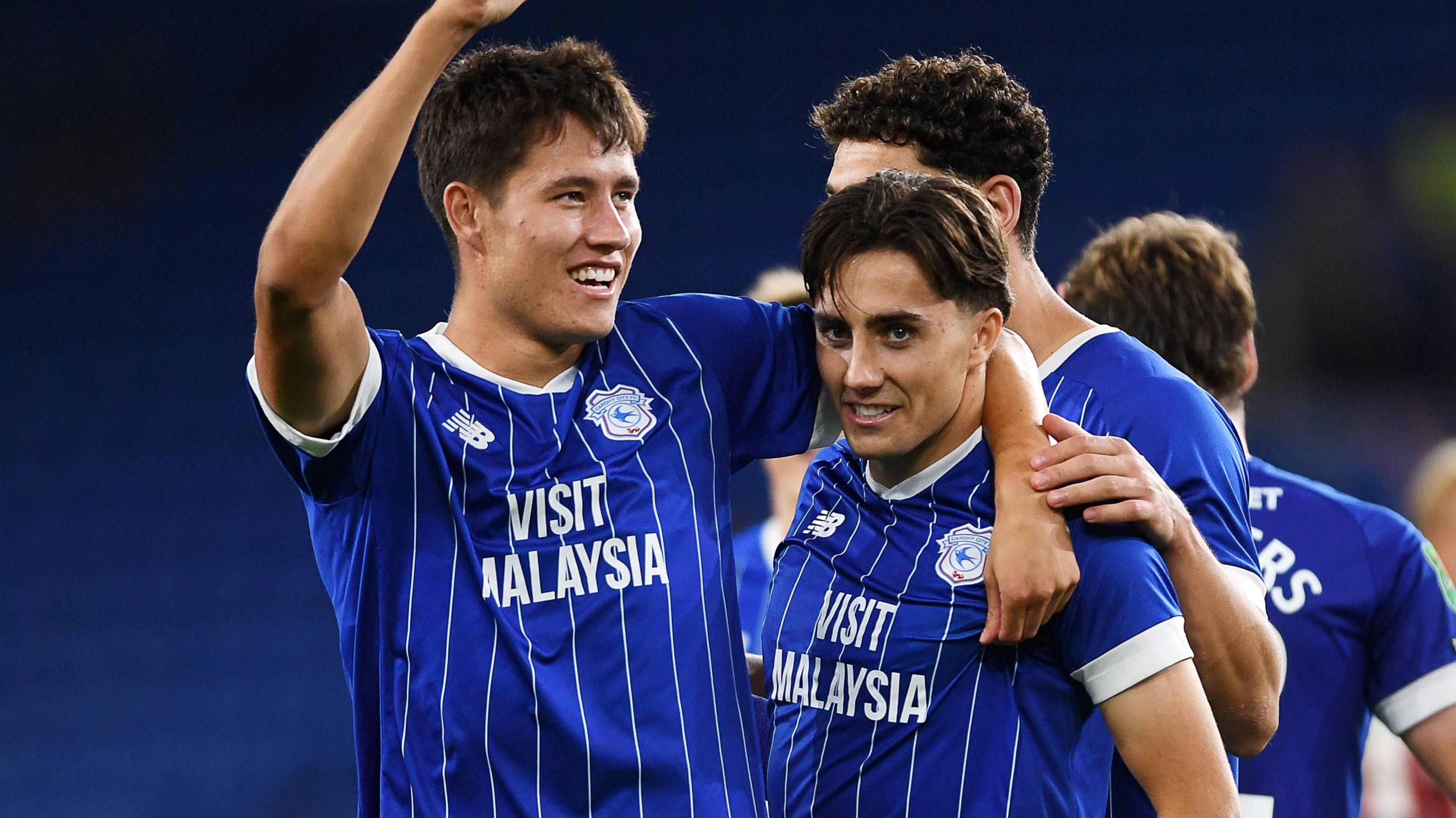 Rubin Colwill (left) and his brother Joel Colwill (right) celebrate