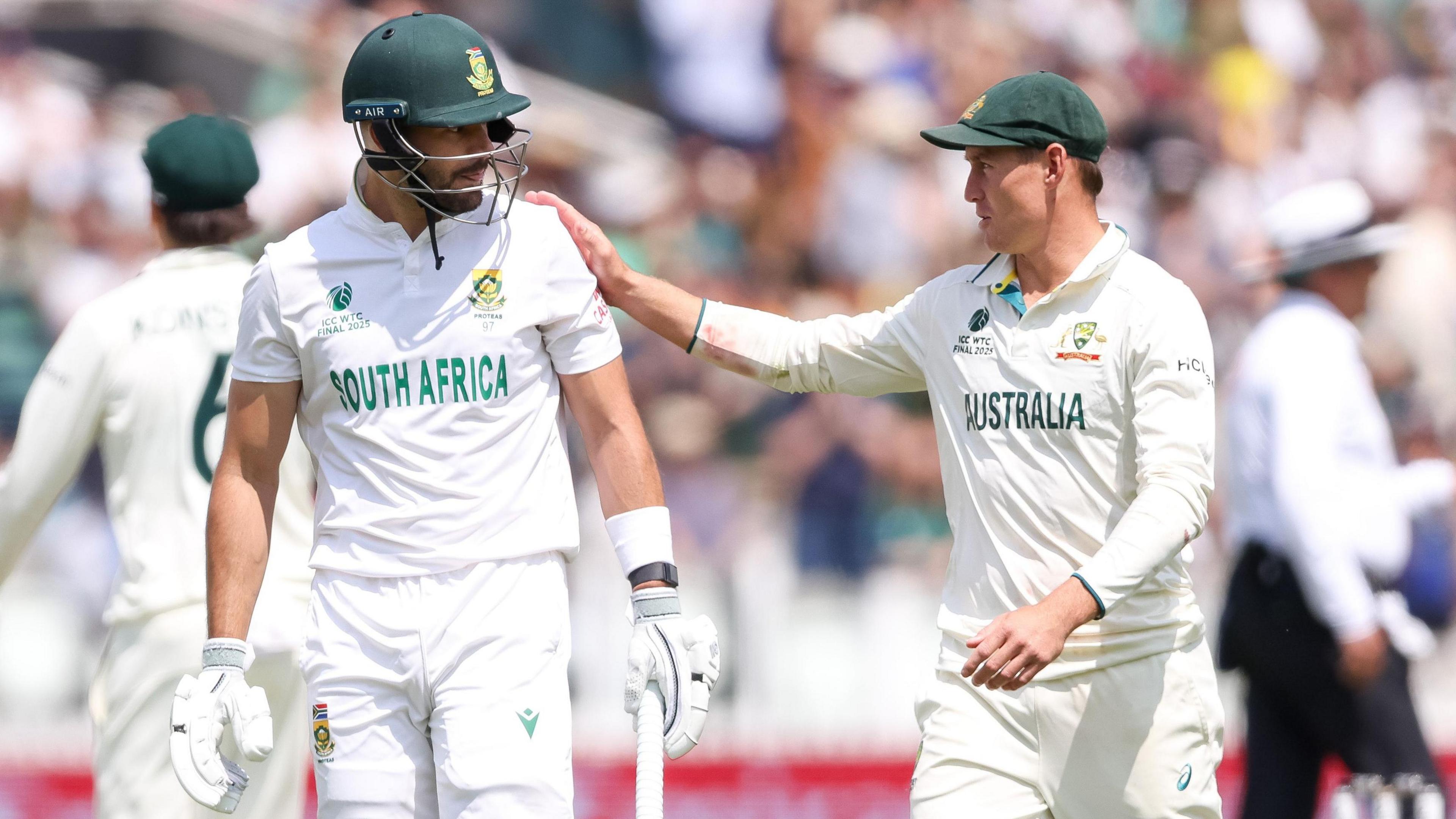 South Africa batter Aiden Markram is congratulated by Australia's Marnus Labuschagne during the ICC World Test Championship final in 2025