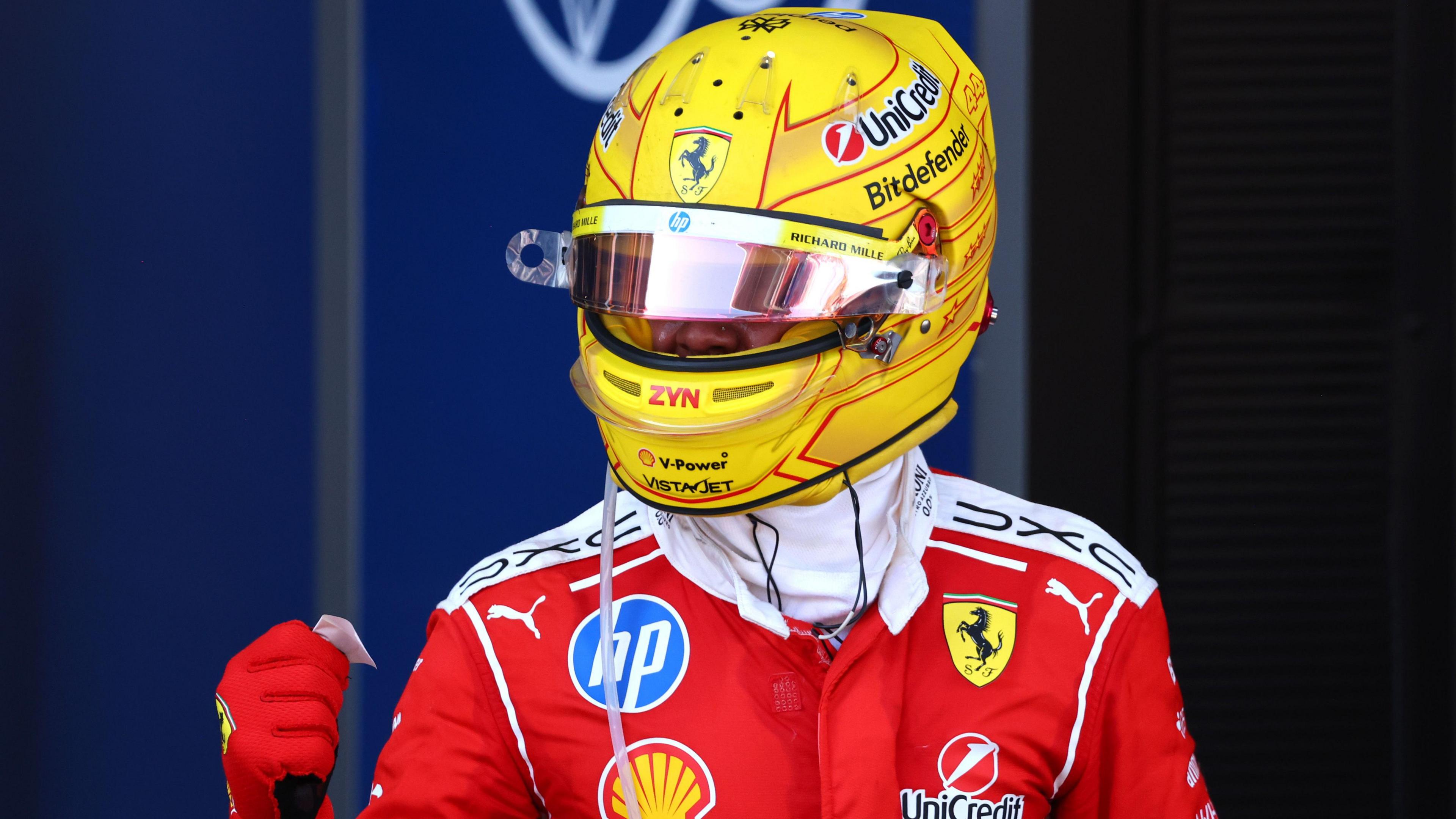 Ferrari's Lewis Hamilton clenches his fist in celebration after winning the Barcelona-Catalunya Grand Prix