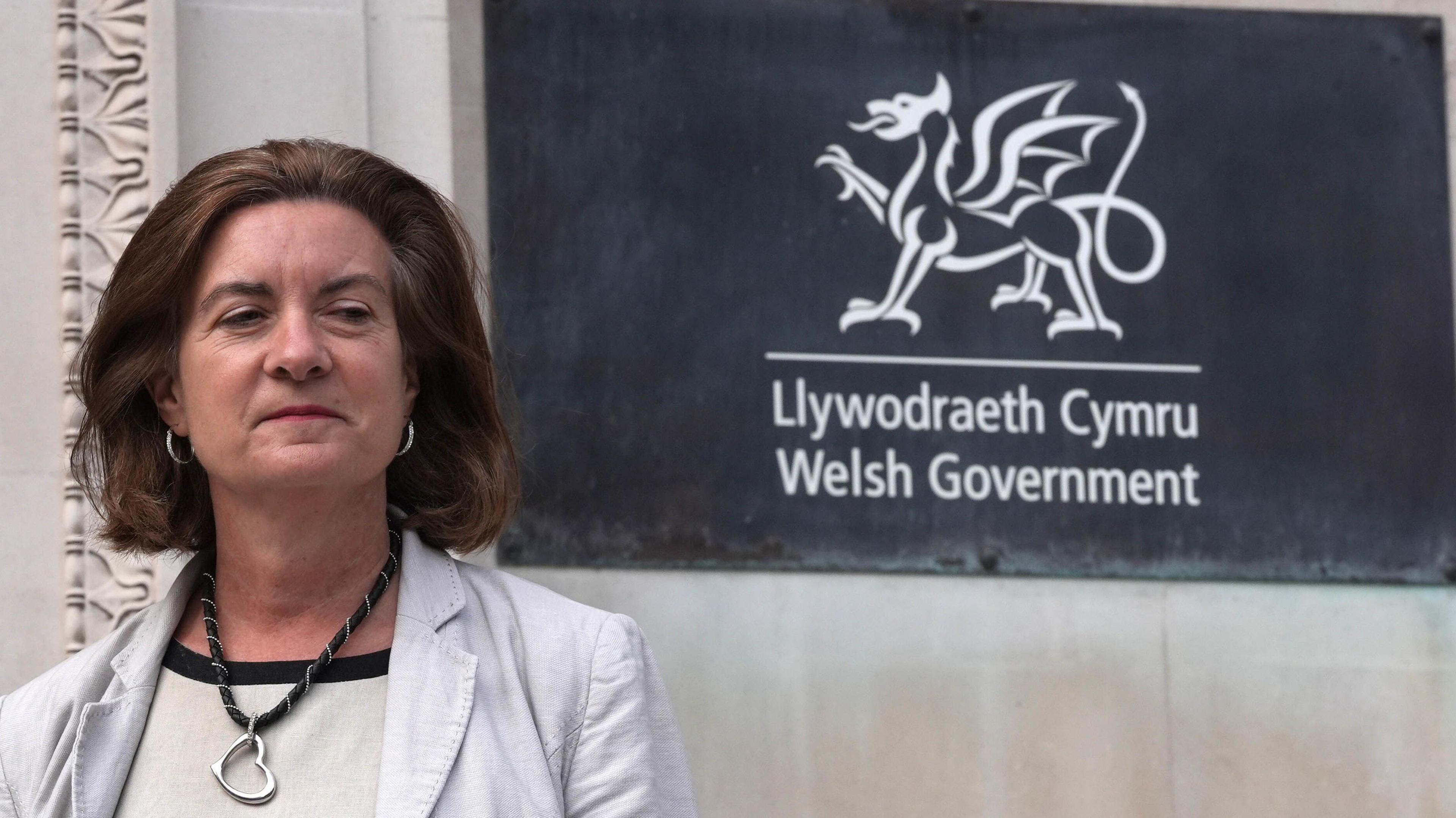 Eluned Morgan at Cathays Park in Cardiff, standing in front of a Welsh government sign