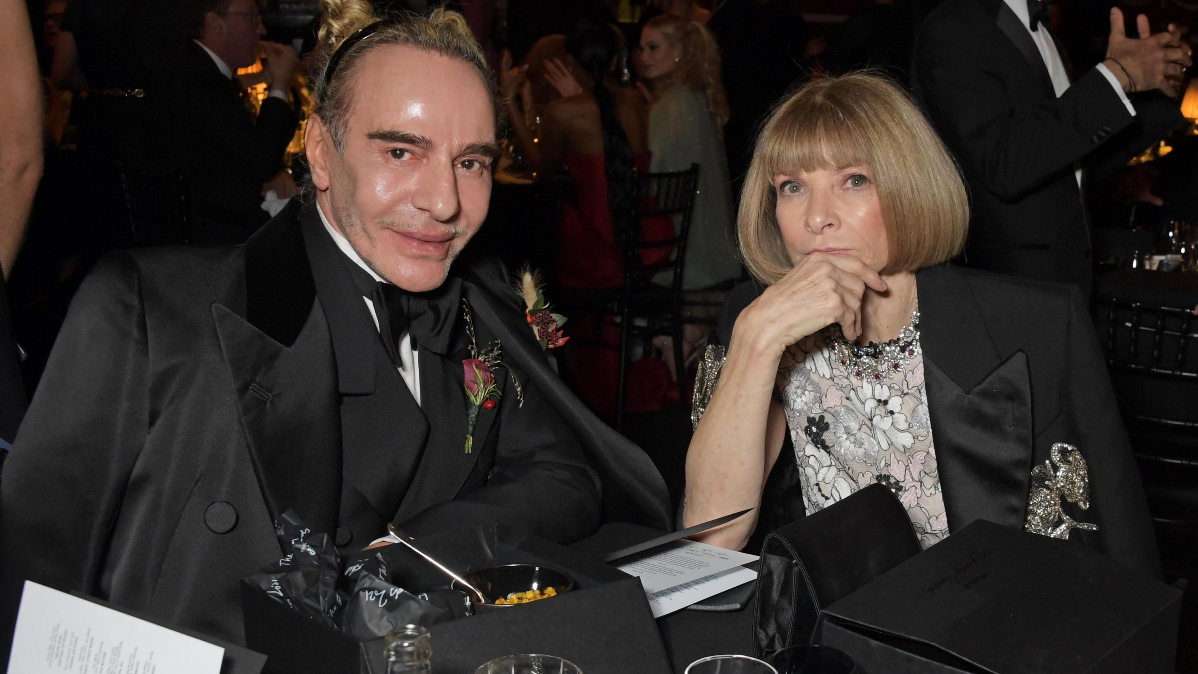 John Galliano and Editor-In-Chief of American Vogue and Chief Content Officer of Conde Nast Dame Anna Wintour attend a cocktail reception ahead of The Fashion Awards 2021 at Royal Albert Hall on November 29, 2021 in London, England.