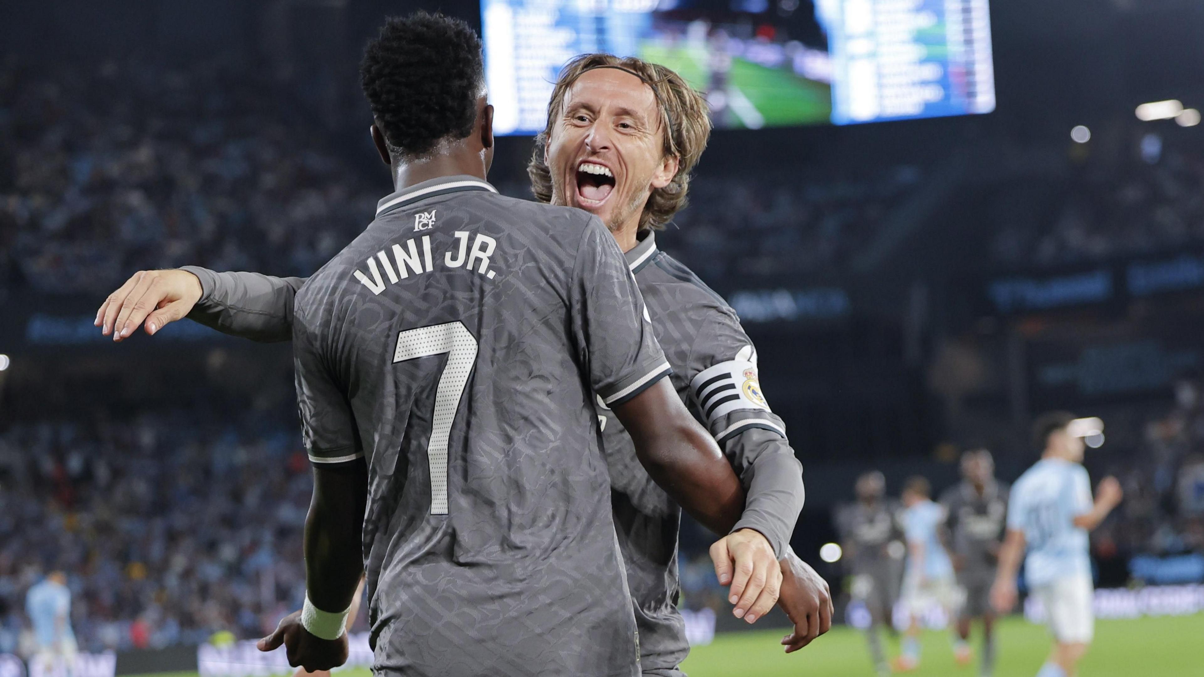 Luka Modric and Vinicius Jr celebrate