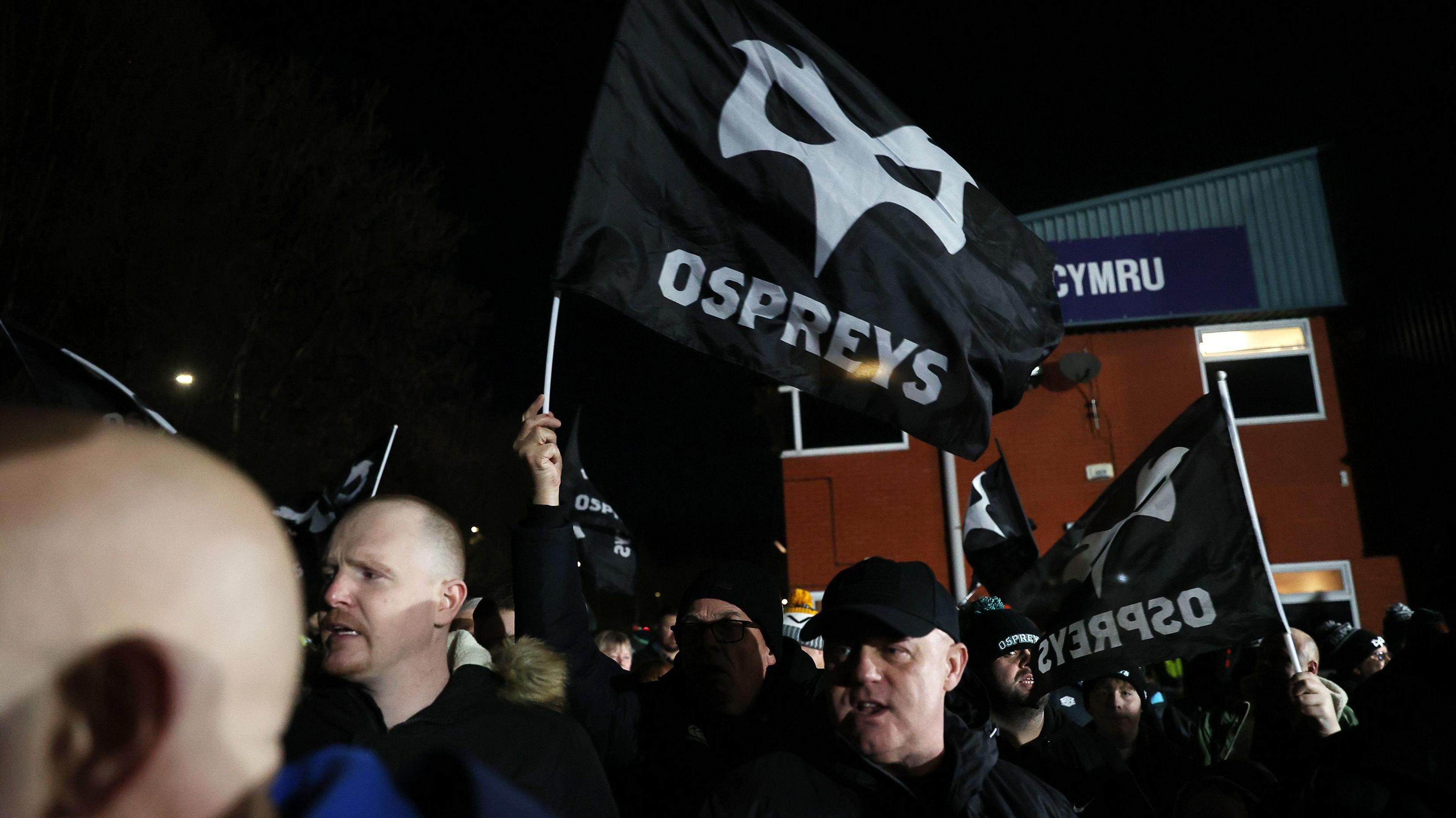 Ospreys fans have protested at the WRU 's plans to sell Cardiff to Ospreys' owners Y11 sport & media