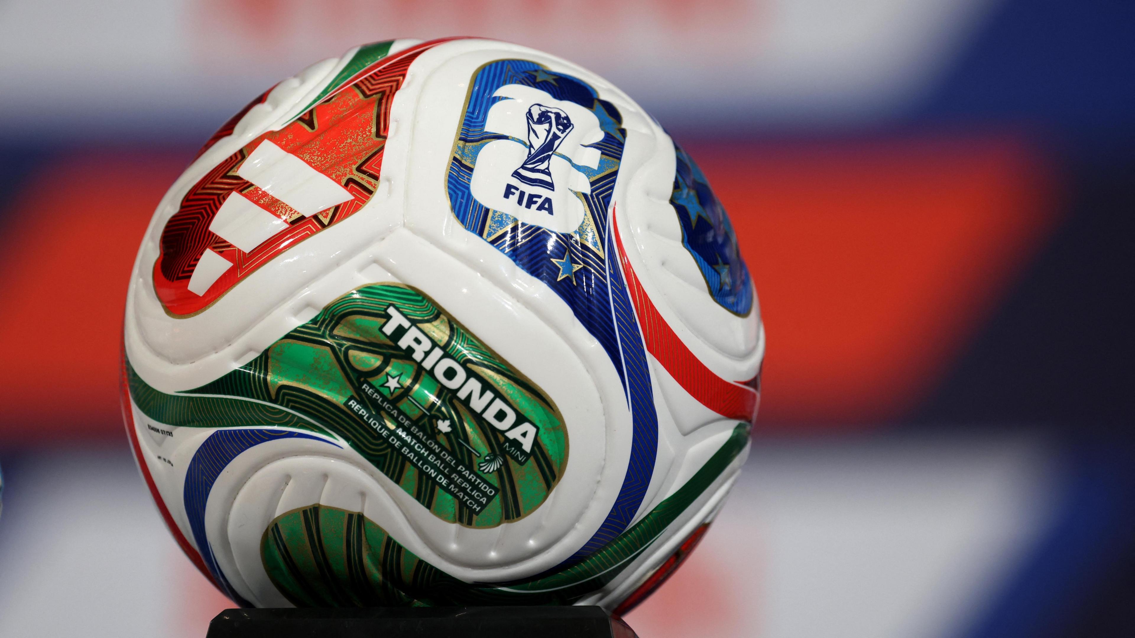 The green, red, white and blue Adidas Trionda football.