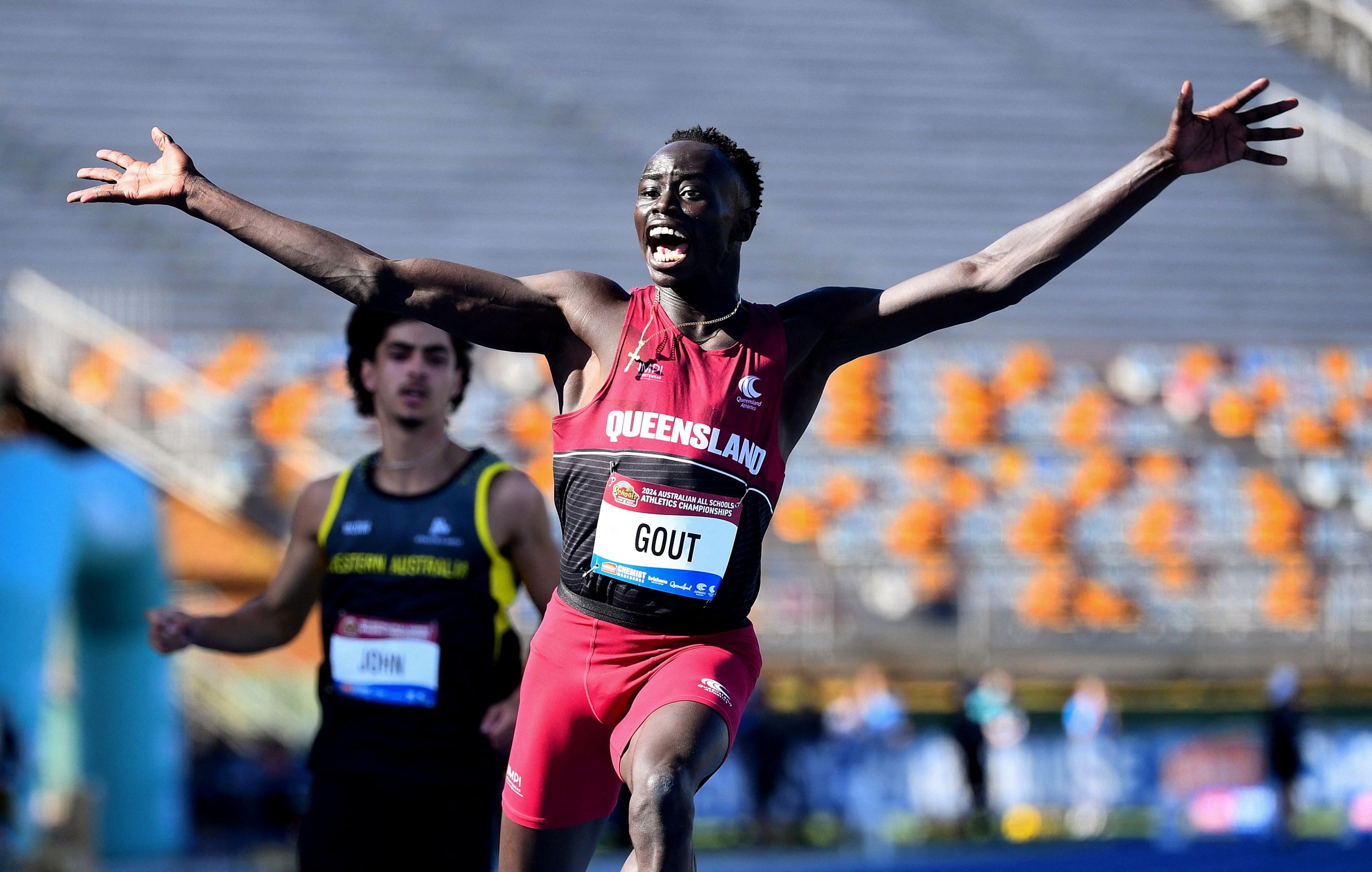 Gout Gout of Australia celebrates winning the U18s, 100m final
