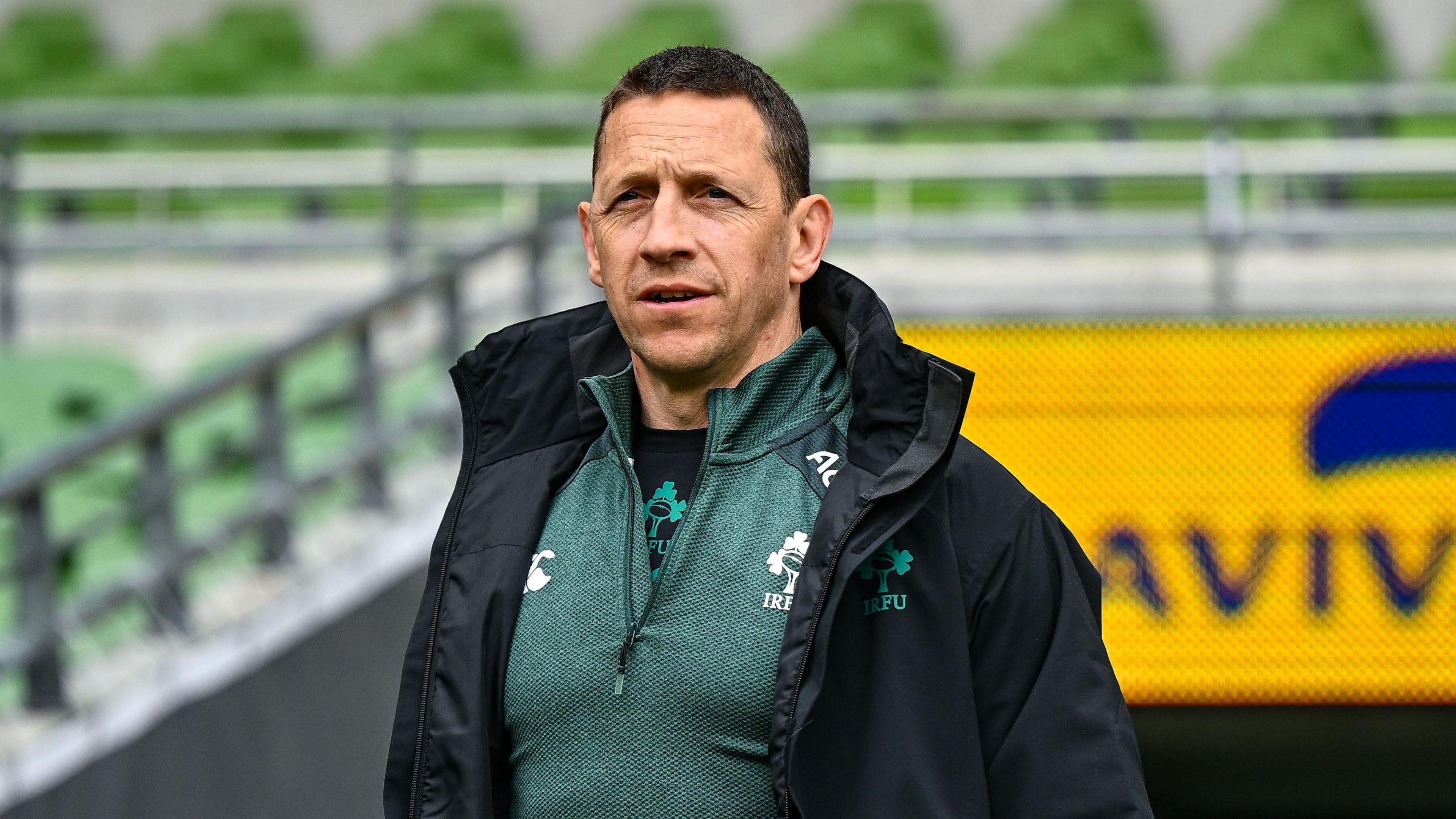 Scott Bemand looks towards the field from the touchline at the Aviva Stadium