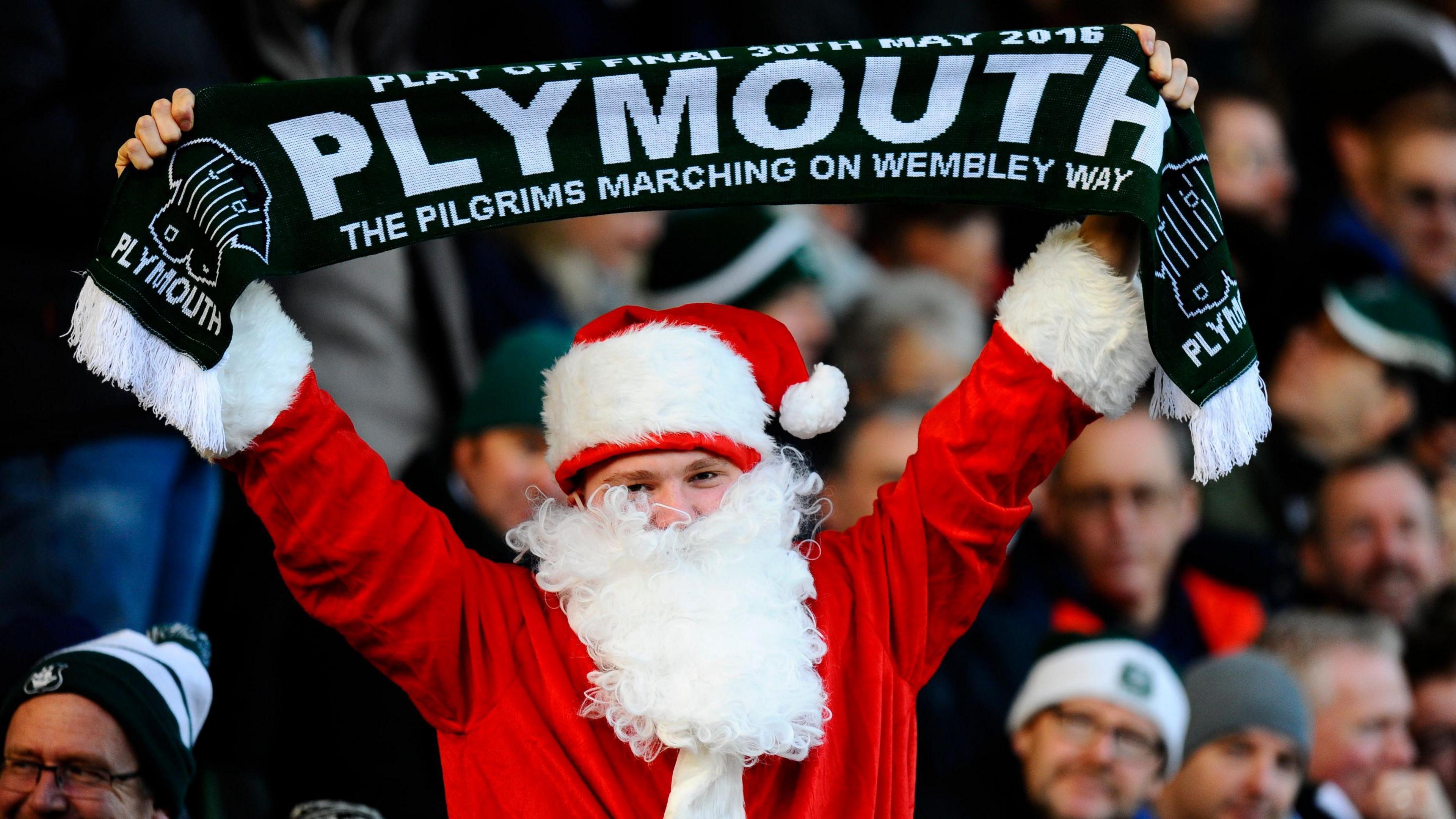 Plymouth Argyle fan dressed as Santa