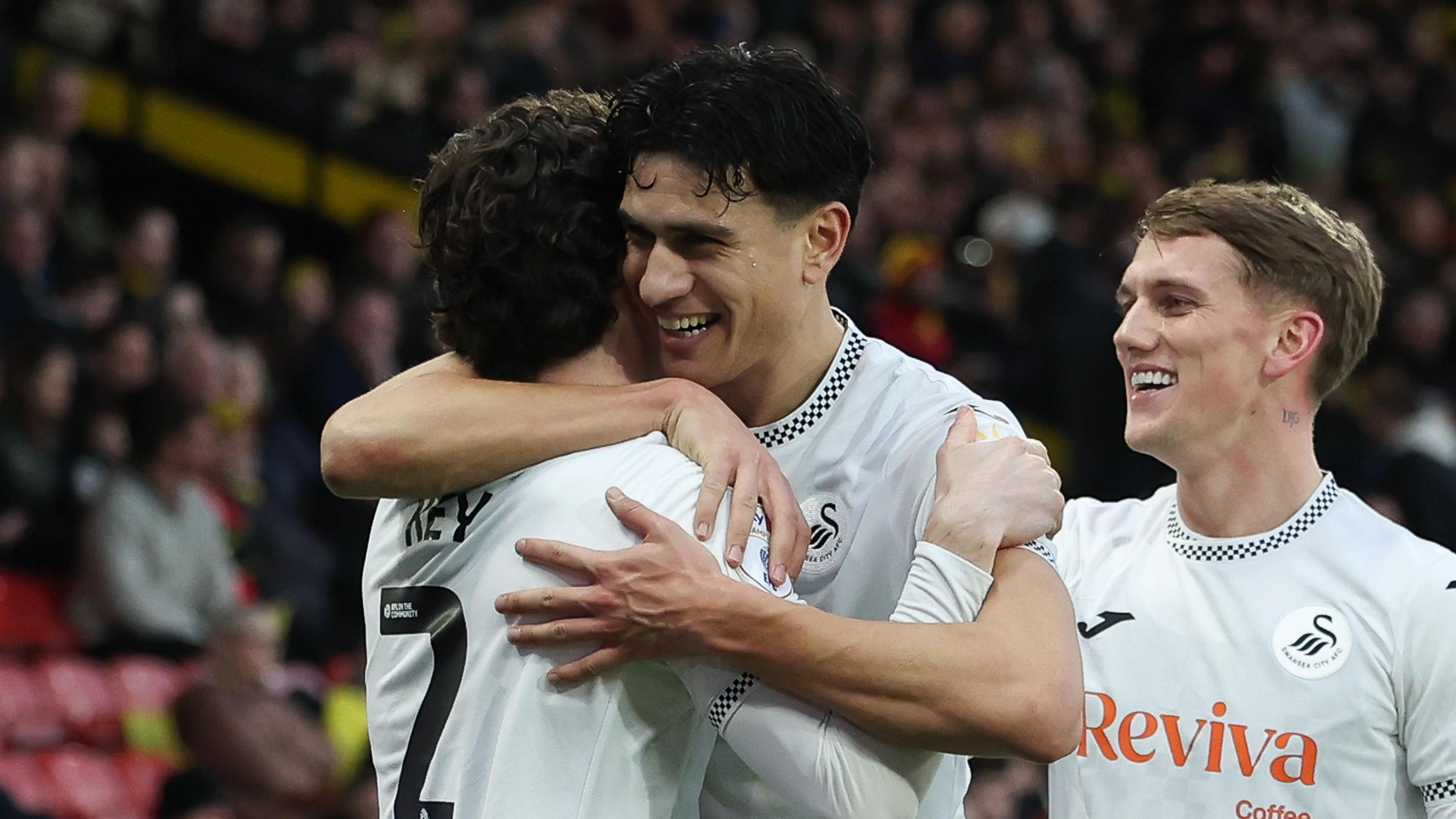 Marko Stamenic and Josh Key celebrate with Ethan Galbraith 