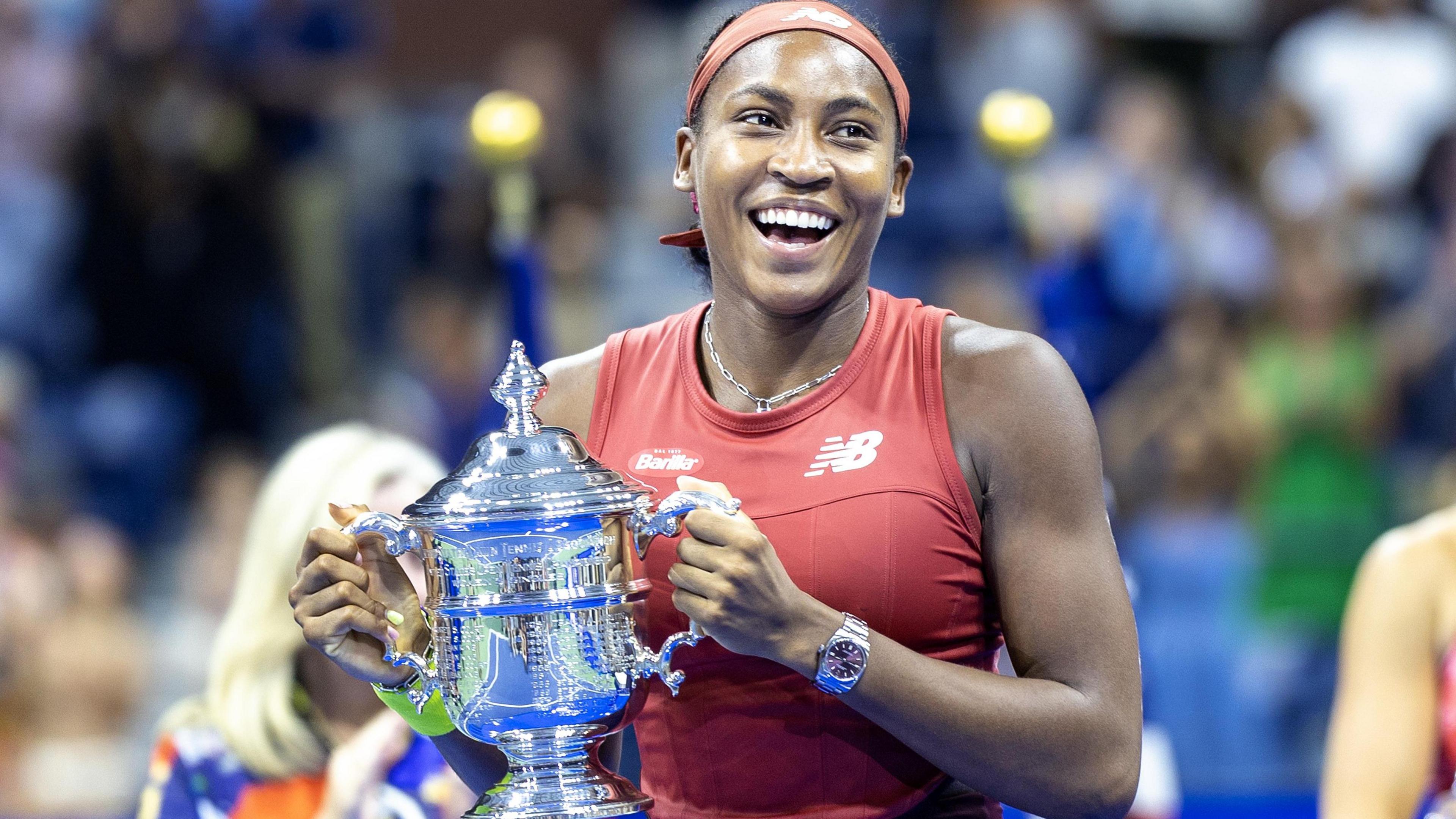 Coco Gauff with the US Open women's trophy in 2023