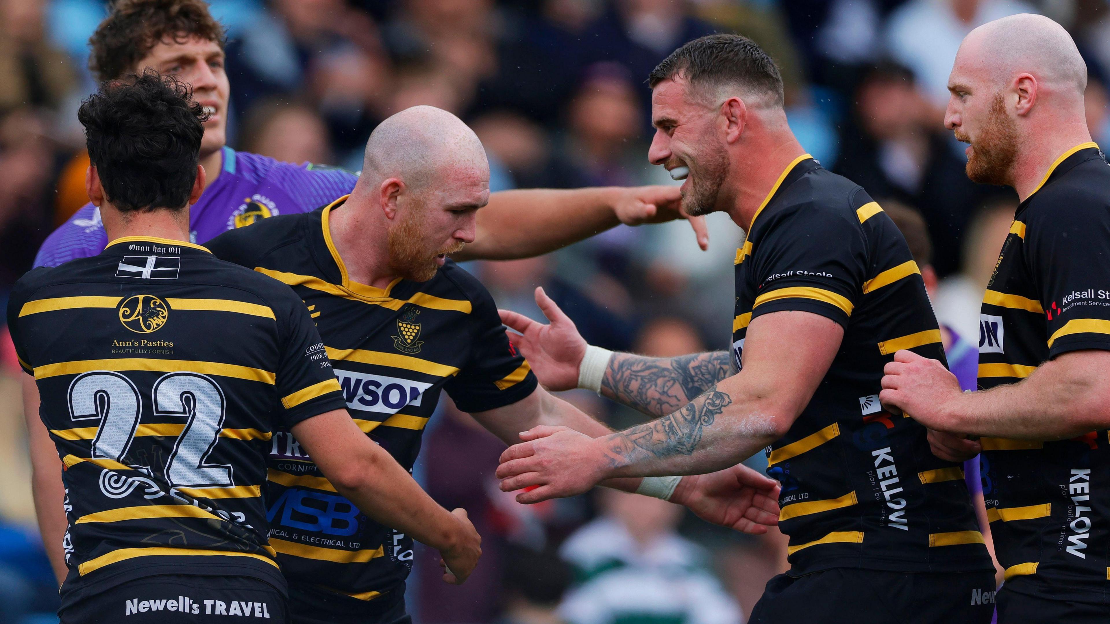 Max Bodilly celebrates scoring a try for Cornwall