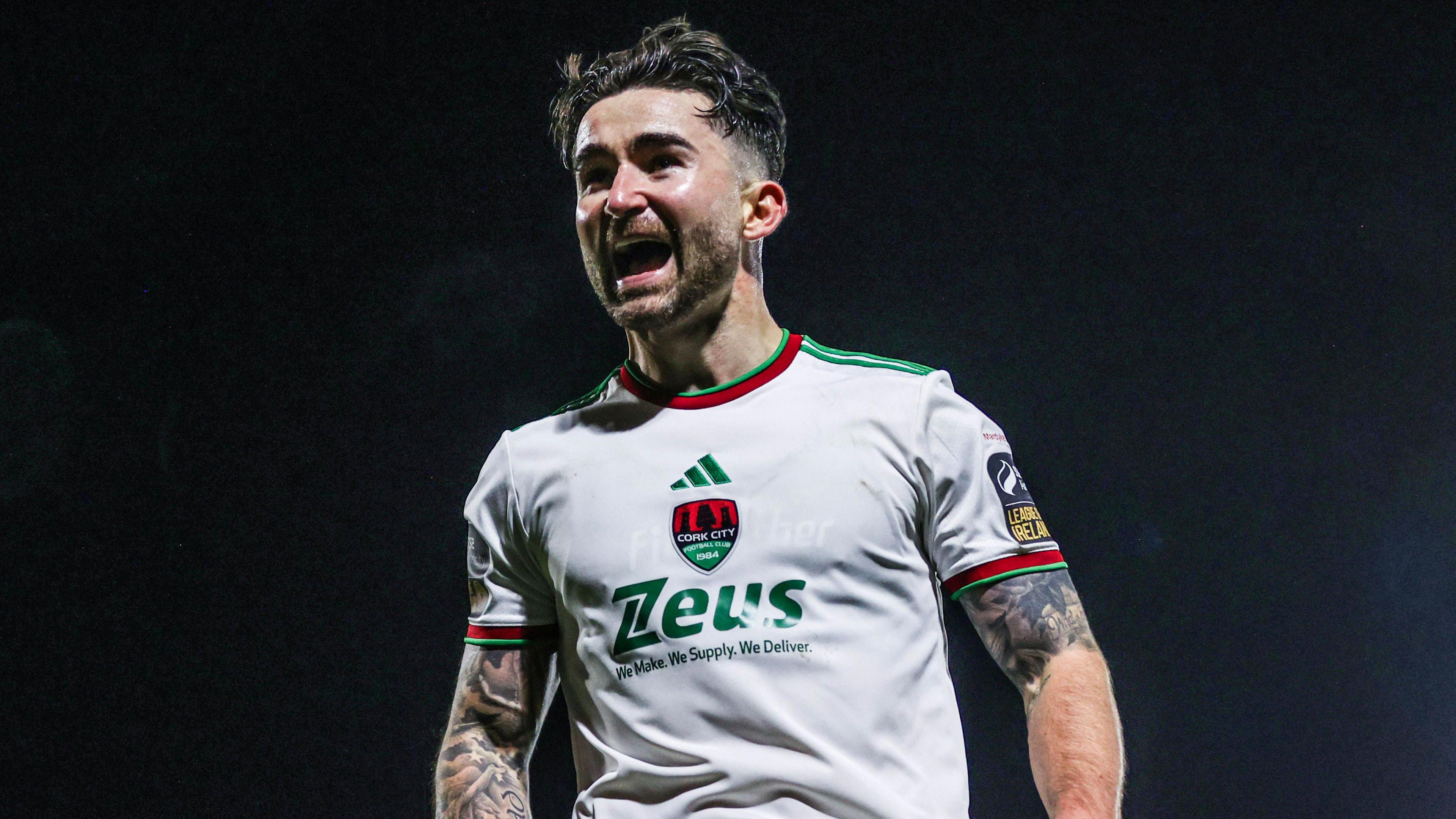 Sean Maguire celebrates scoring for Cork City