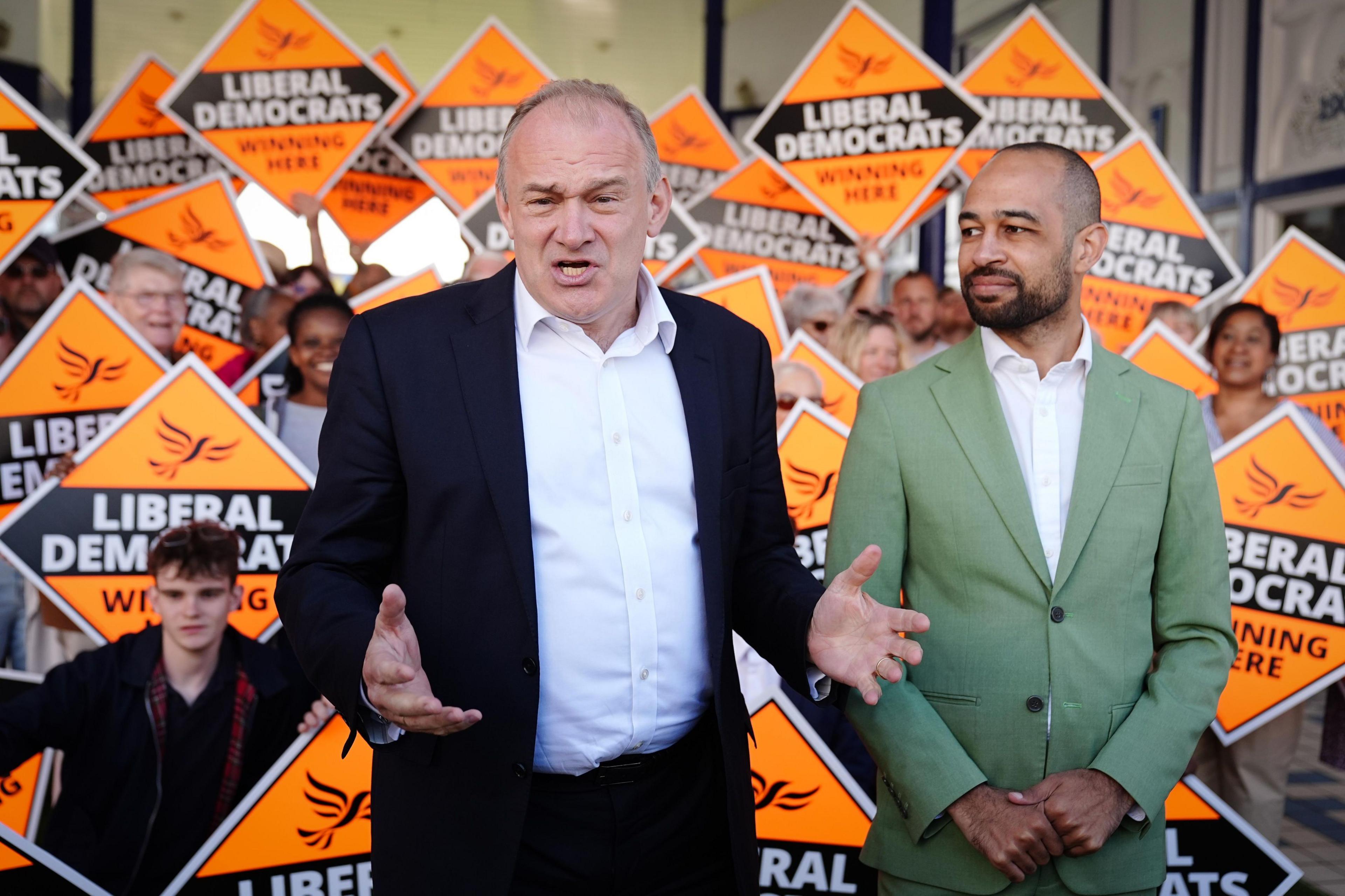 Ed Davey and Josh Babarinde on the campaign trail during the general election campaign in 2024