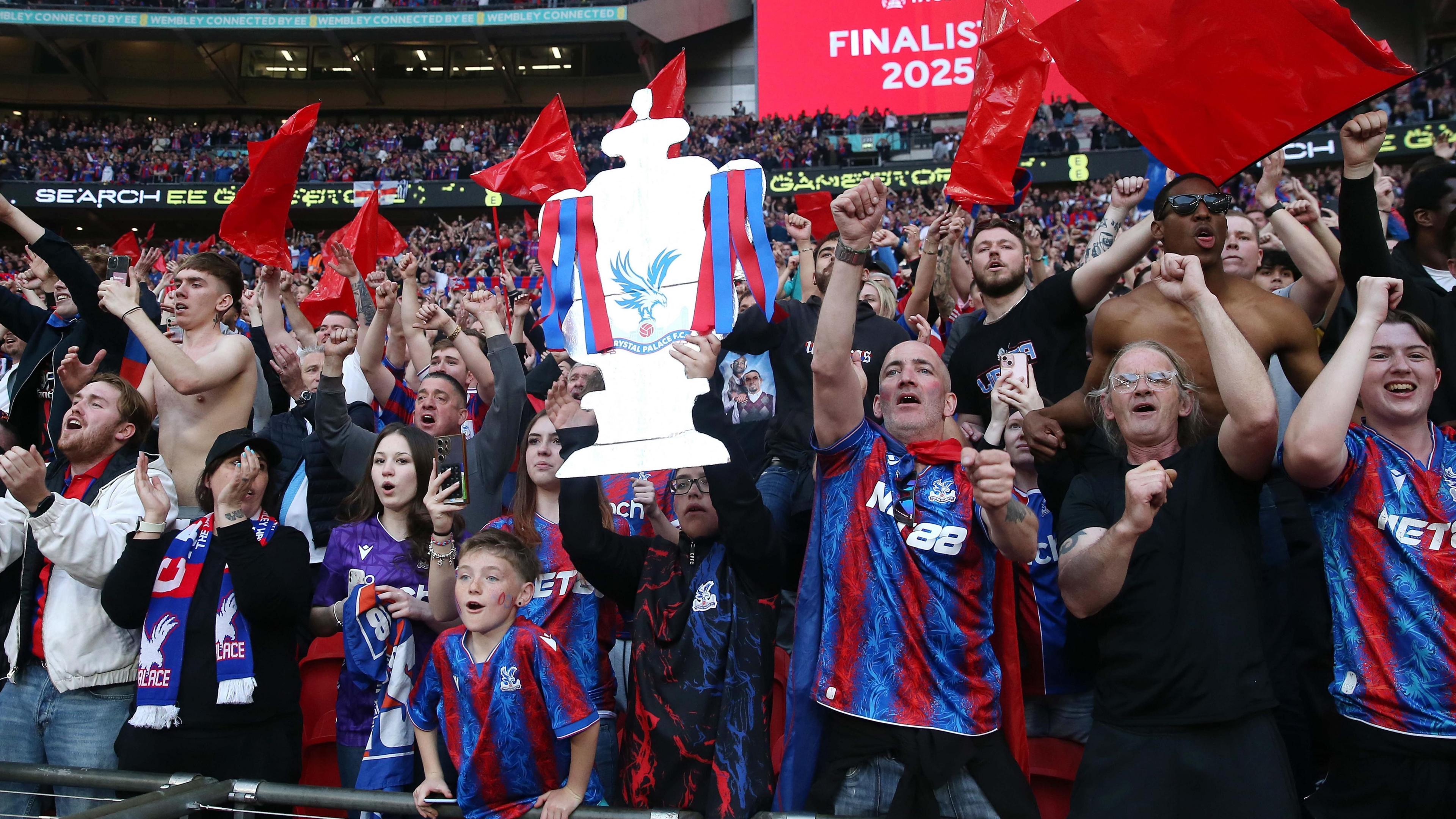 Crystal Palace fans celebrate reaching the FA Cup final at Wembley