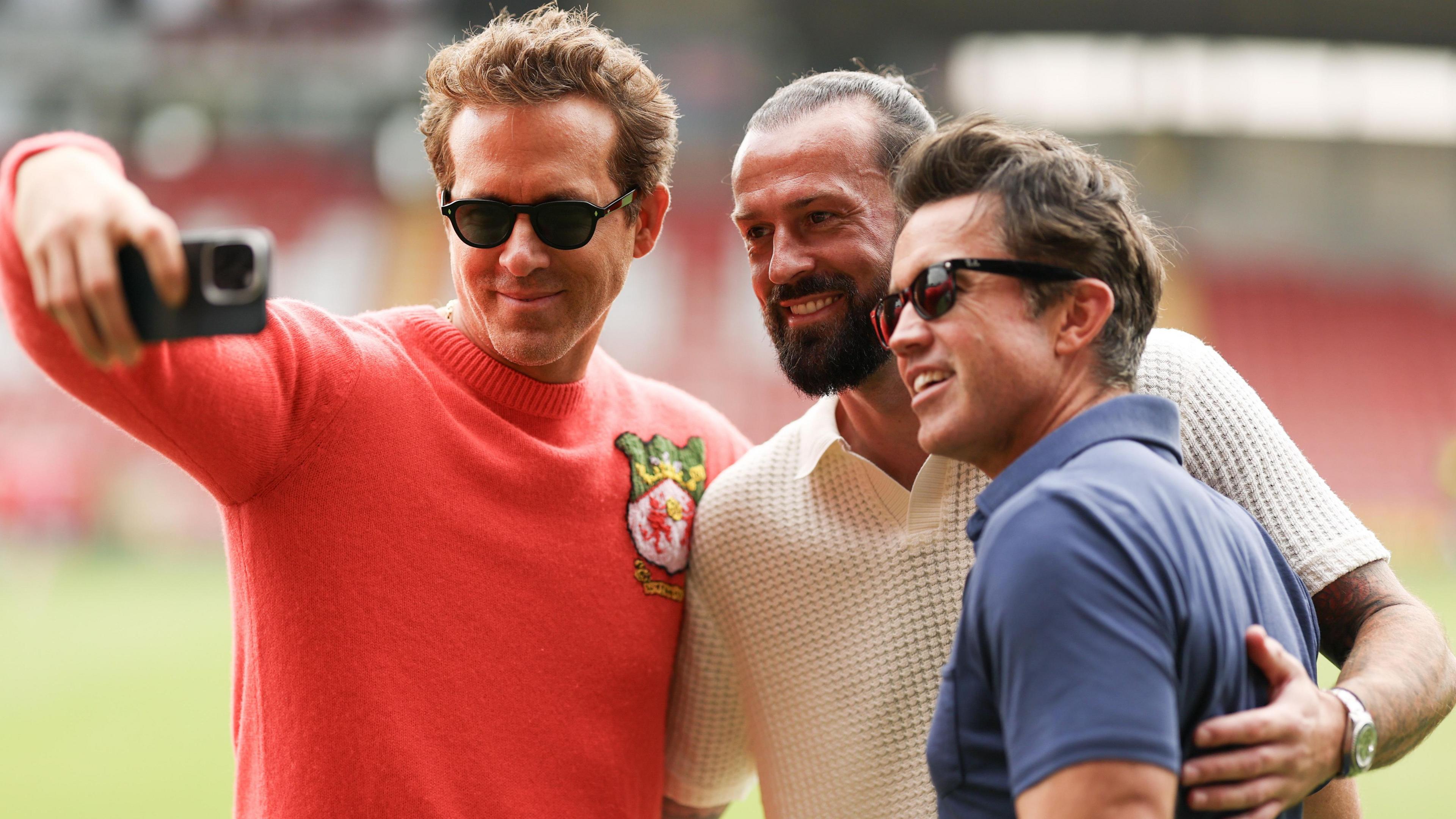 Ryan Reynolds, Steve Fletcher and Rob Mac pose for a selfie