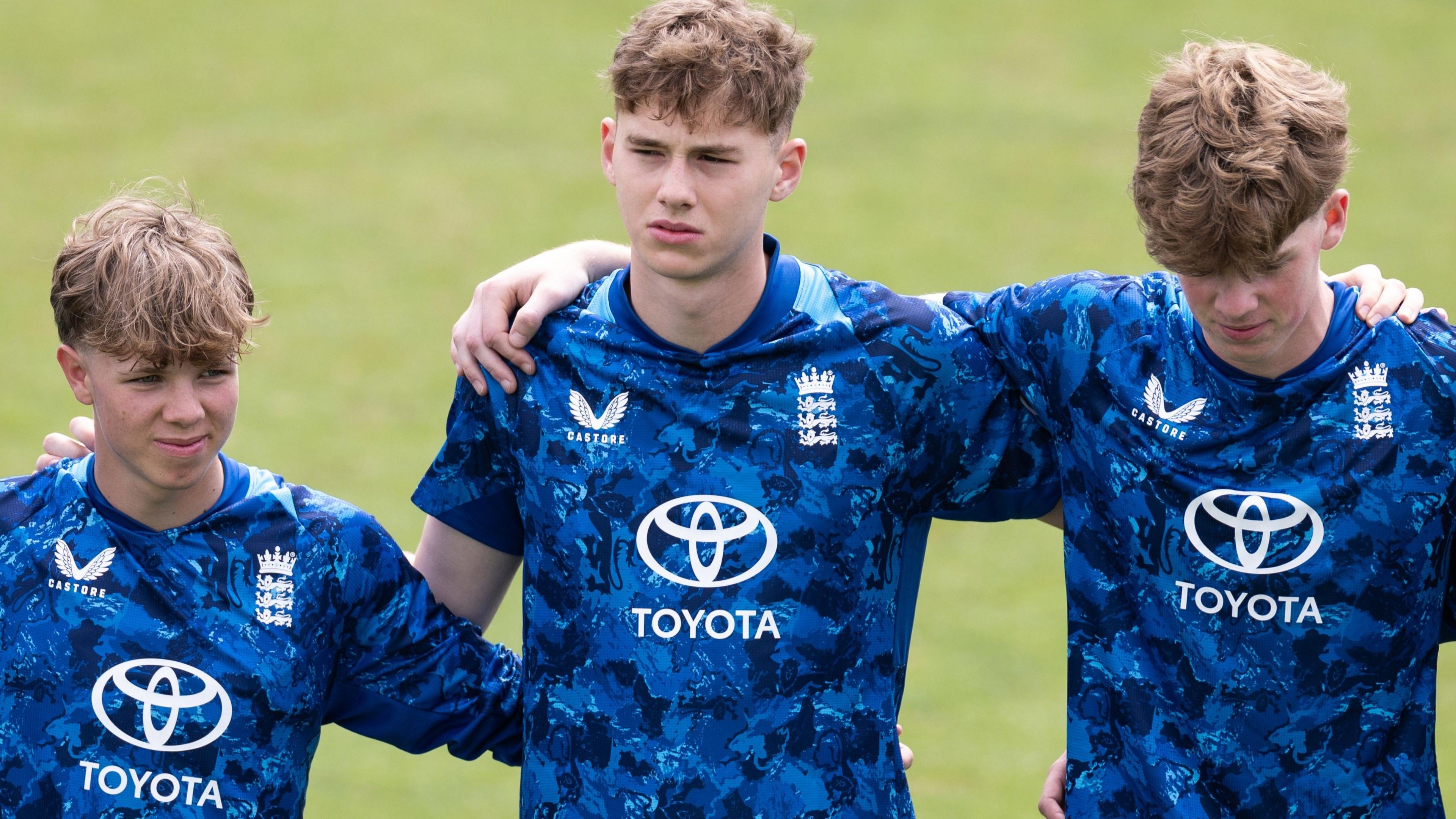 Rocky Flintoff stands with England U19s team-mates 