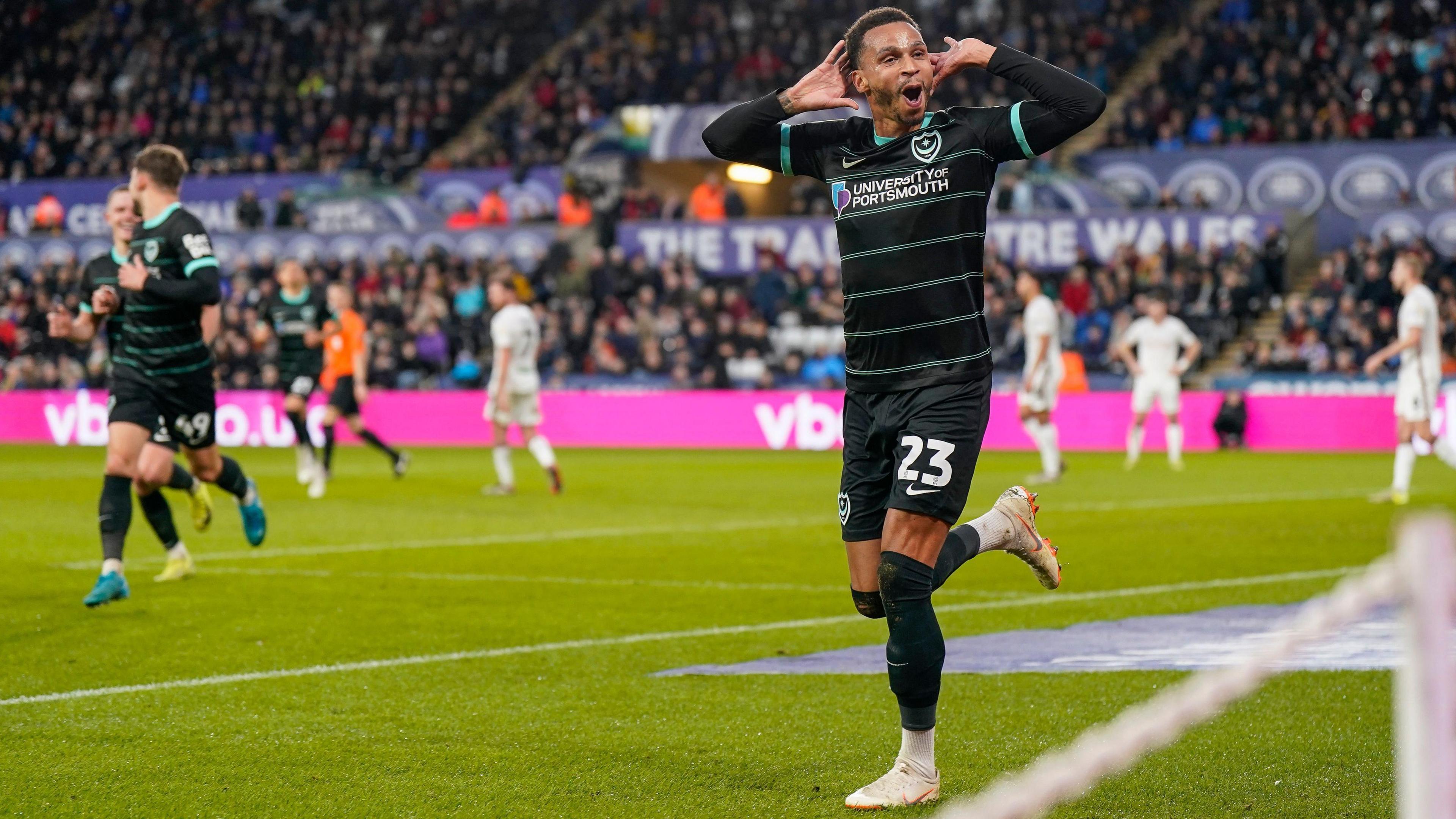 Josh Murphy celebrates scoring for Portsmouth at Swansea