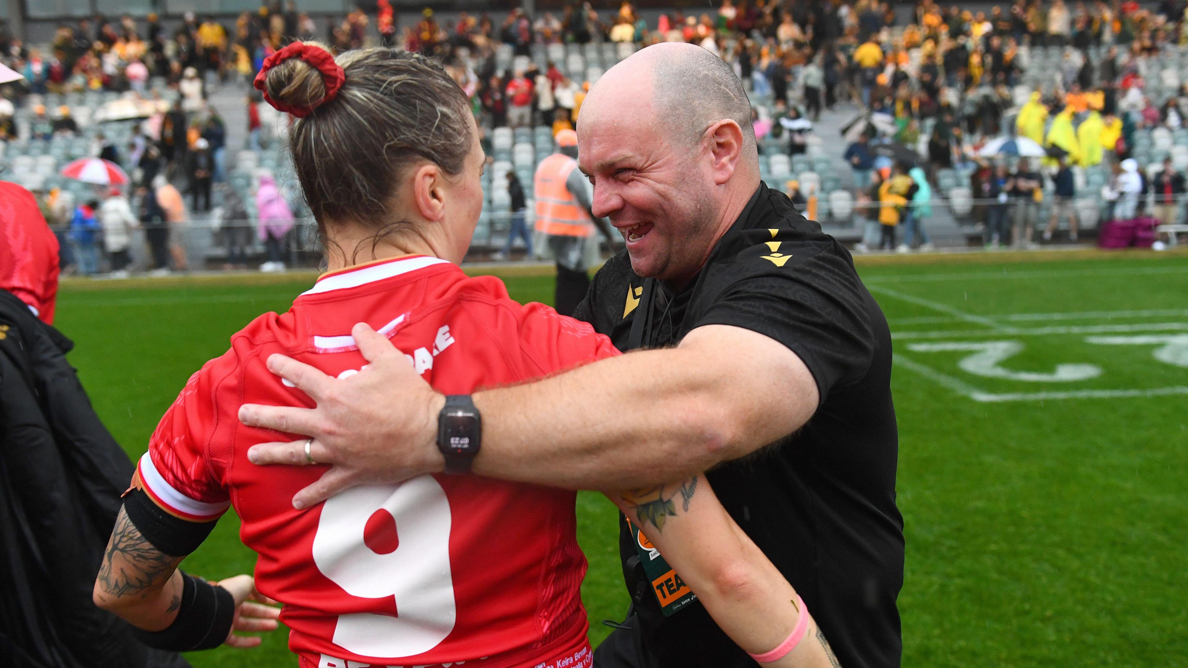 Sean Lynn celebrates victory over Australia with Keira Bevan