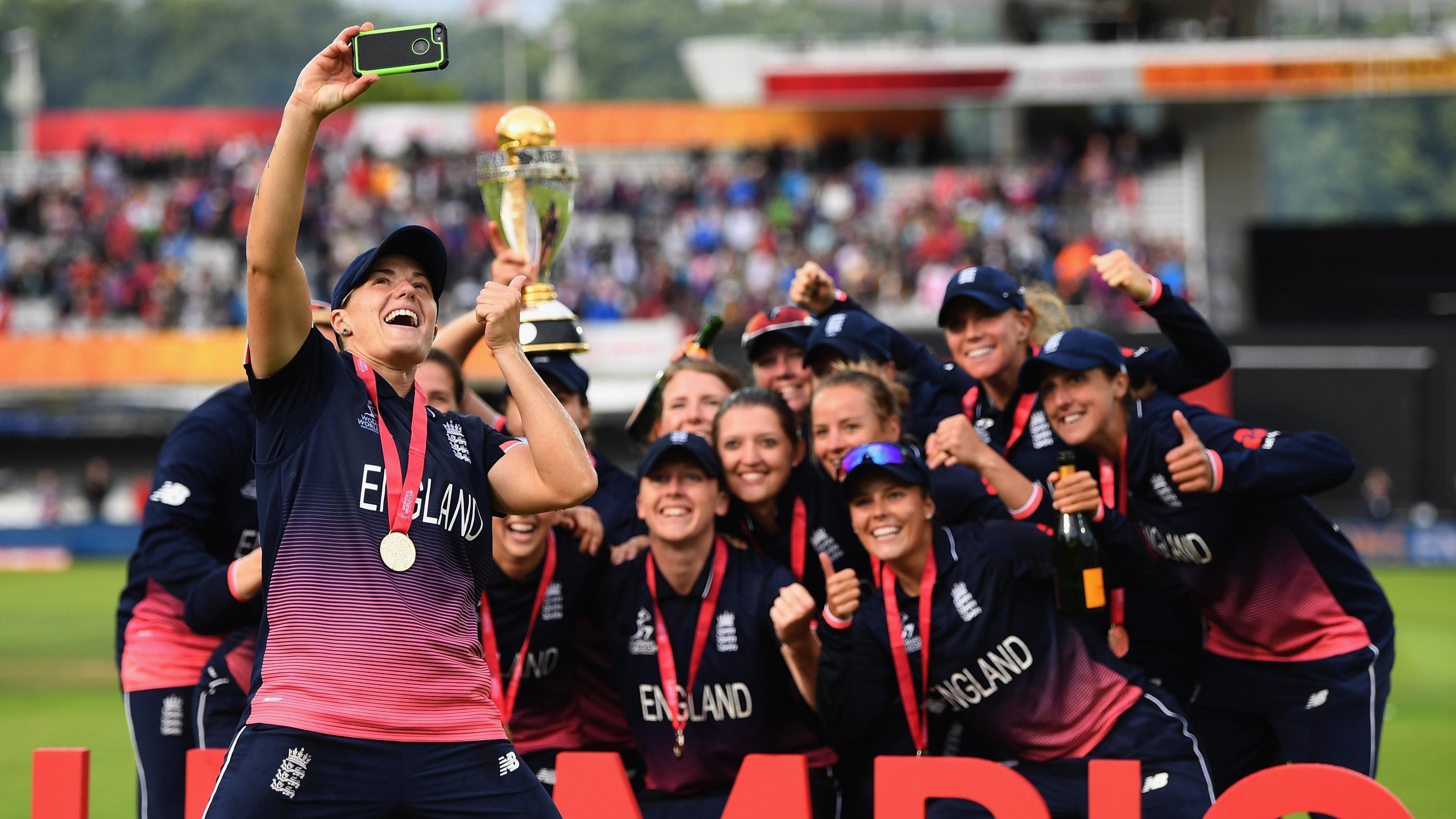 England celebrate winning the 2017 World Cup, with Katherine Brunt, as she was then known, taking a selfie in front of the rest of the team