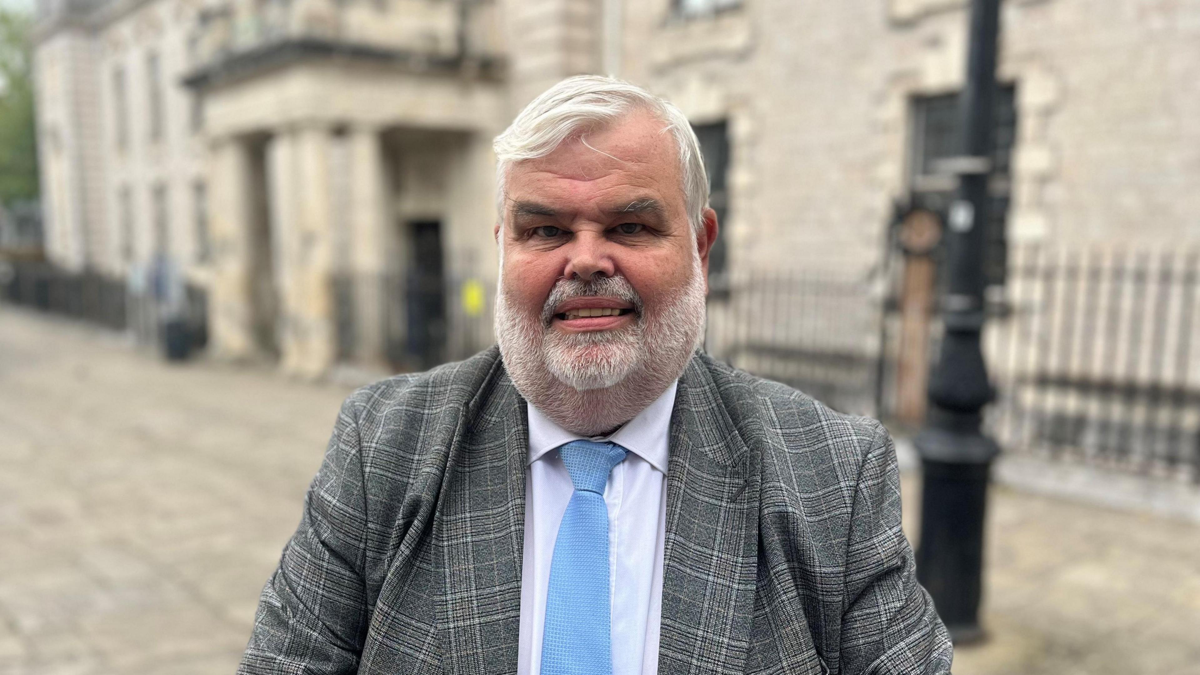 Council Leader David Thomas standing outside Torquay Town Hall