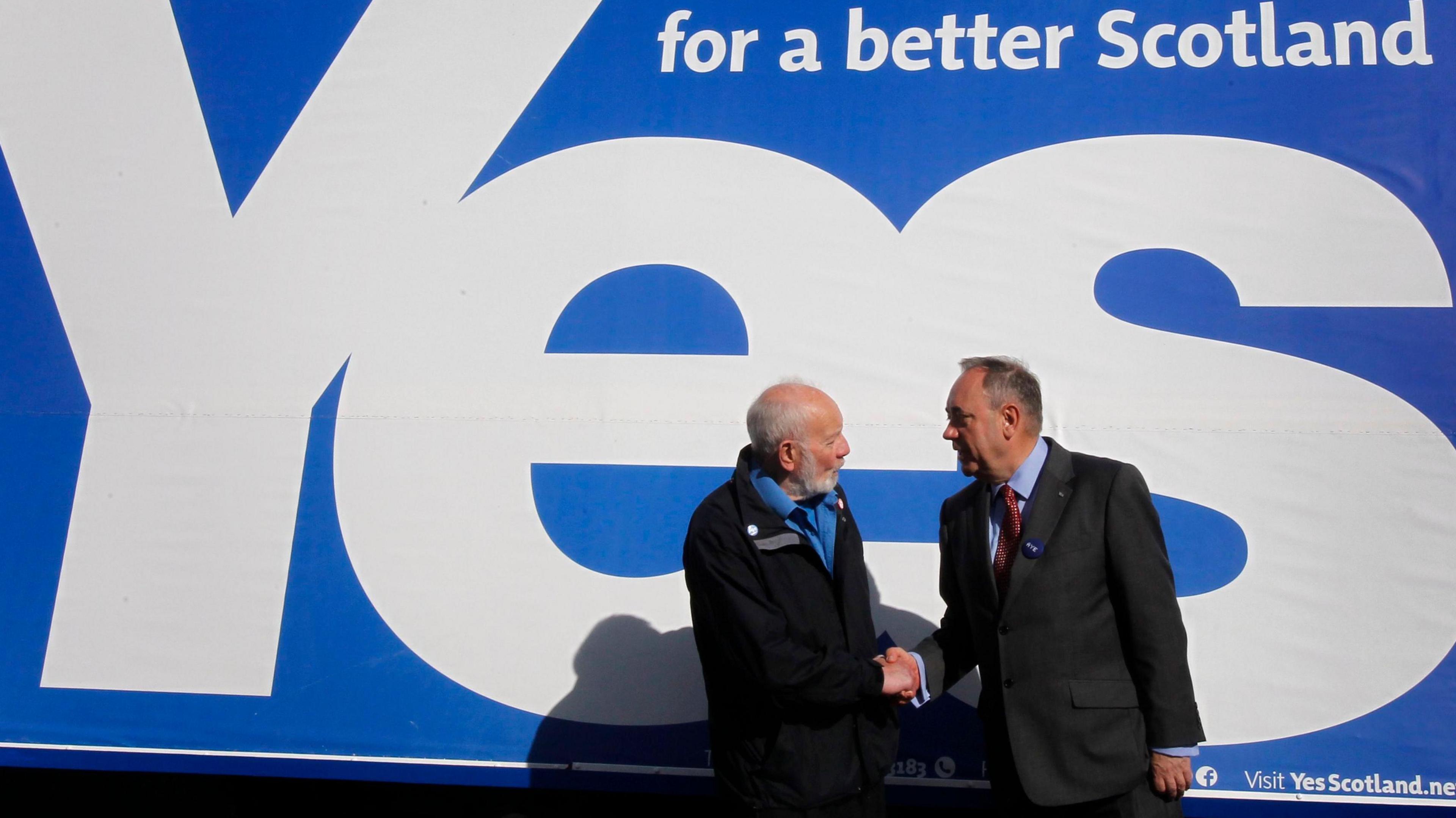 Scottish First Minister Alex Salmond chats to a member of the public during campaigning for the Yes campaign near Tannadice Stadium in Dundee ahead of the Scottish independence referendum on September 18.