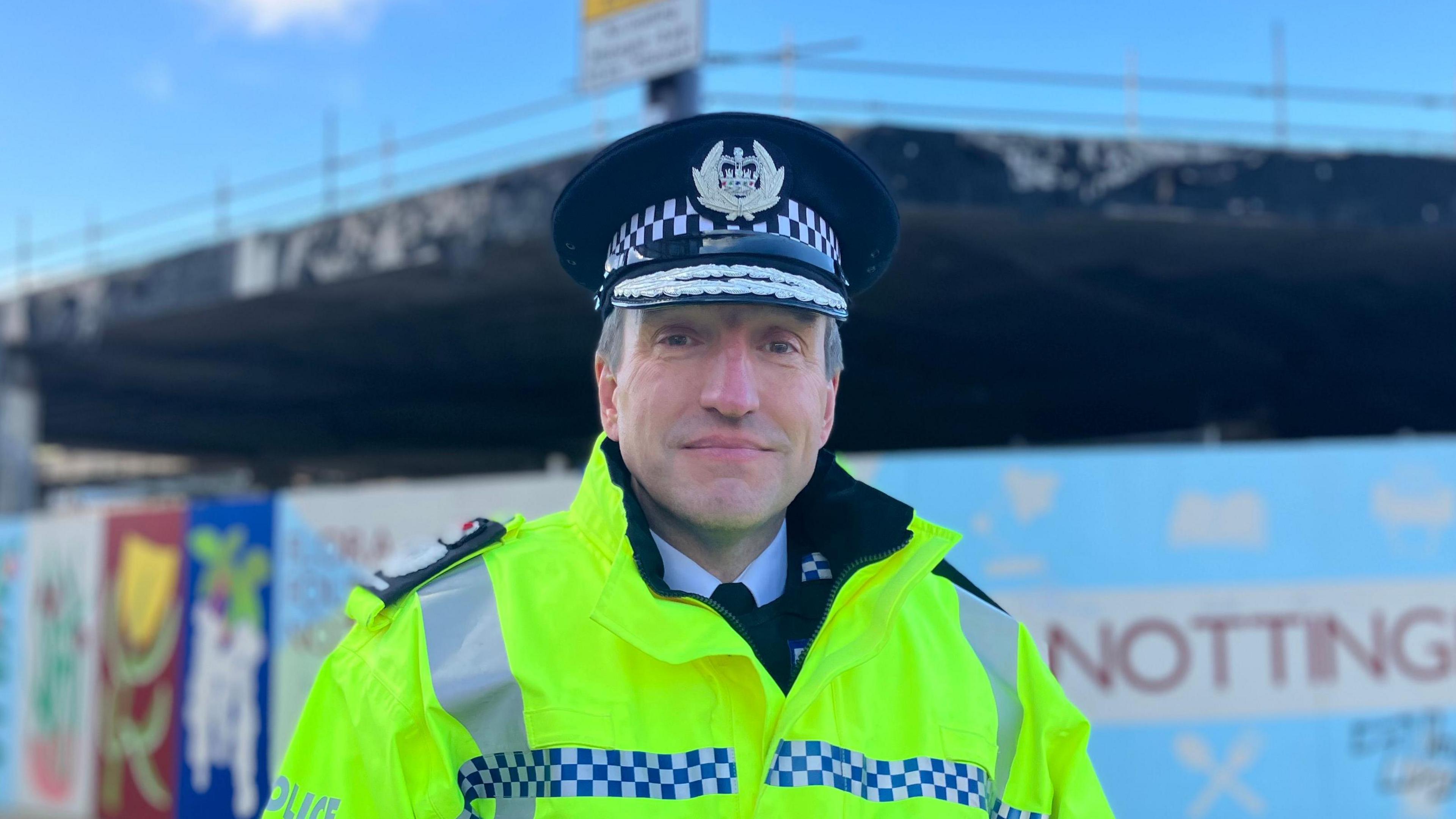 A photograph of a police officer in uniform 