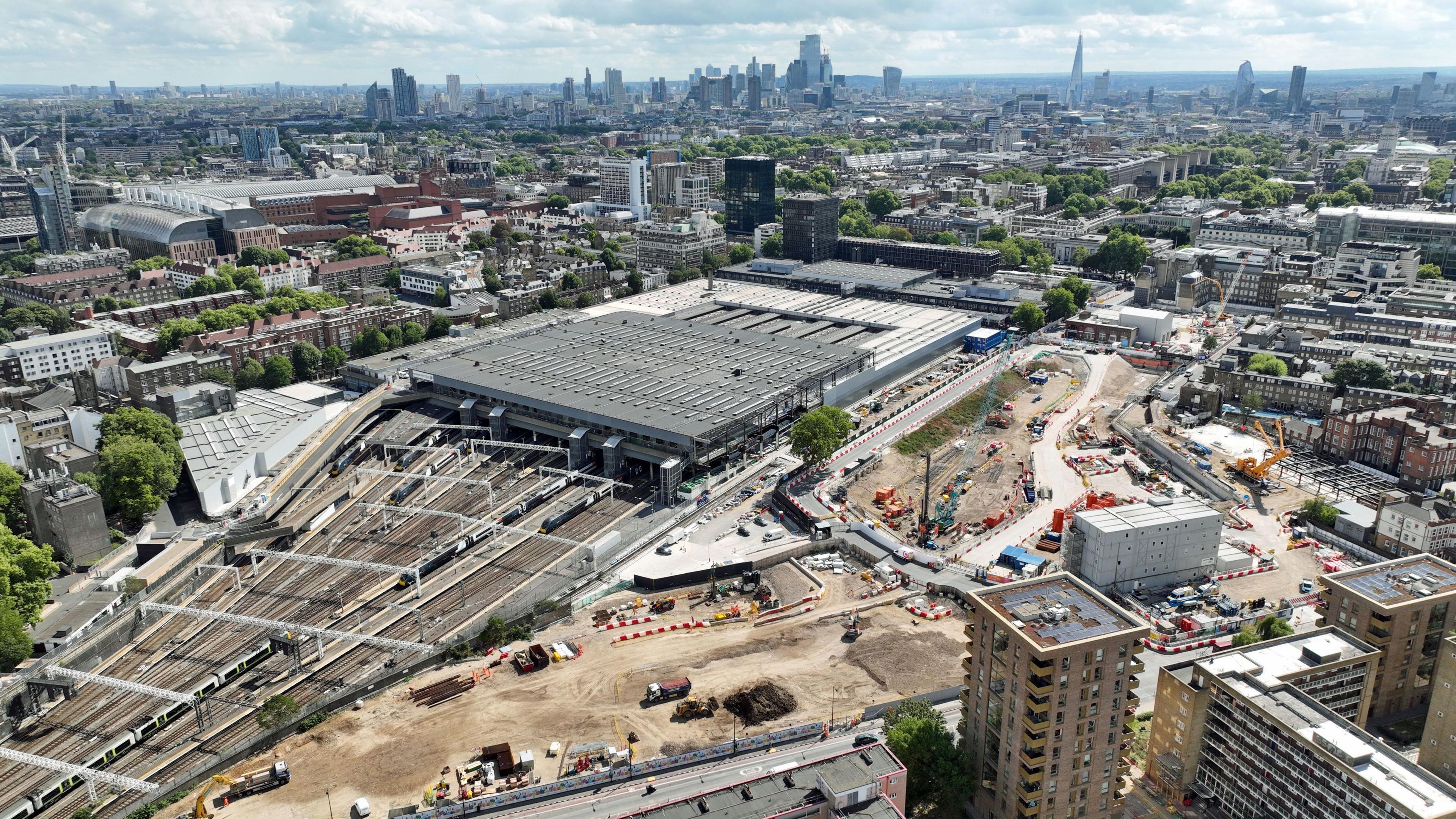 Aerial view of Euston station showing the construction area of HS2 as well as buildings and train tracks