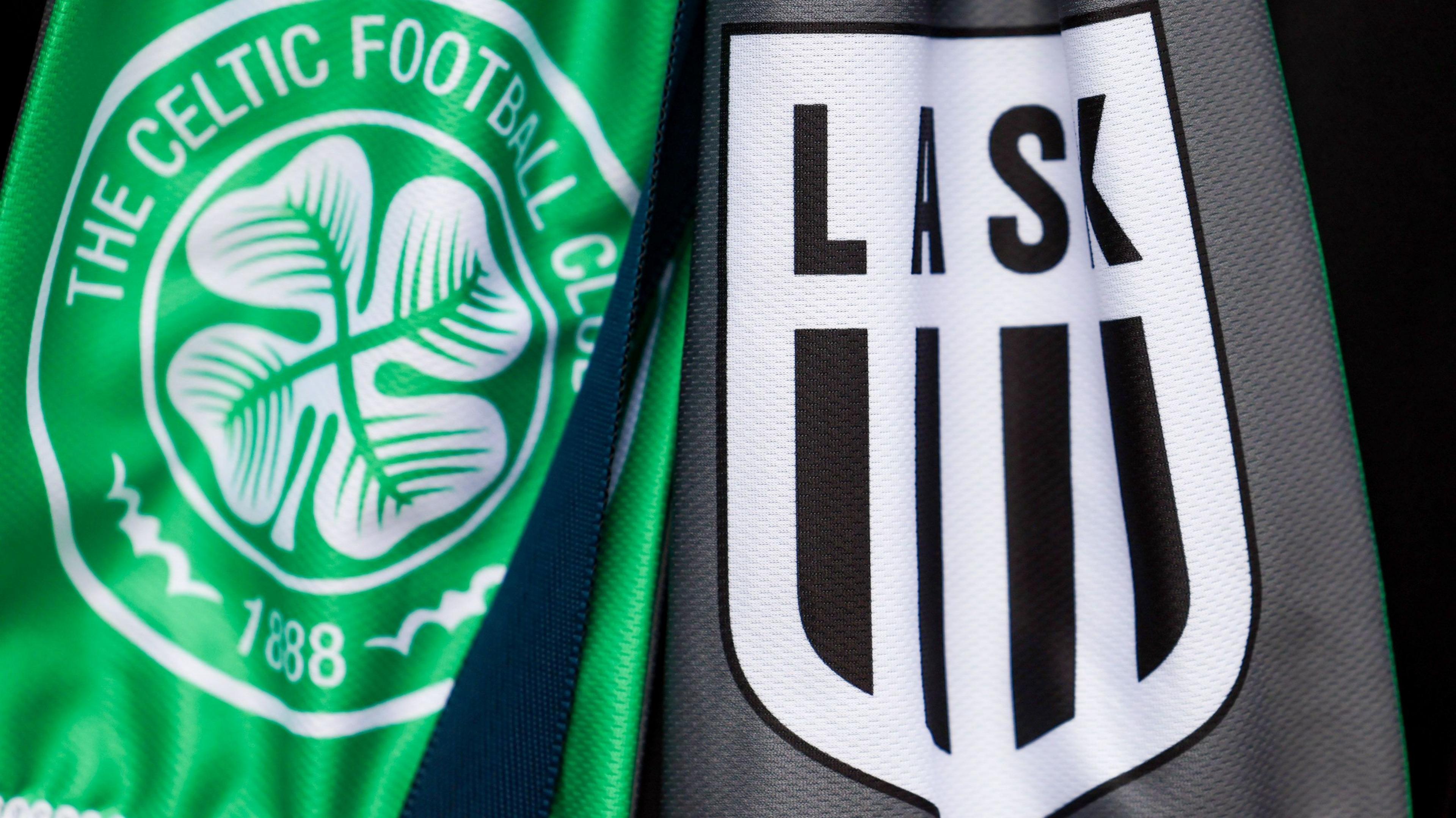 Close up of a green and white Celtic scarf and a black and white LASK scarf, featuring the logos of both clubs 