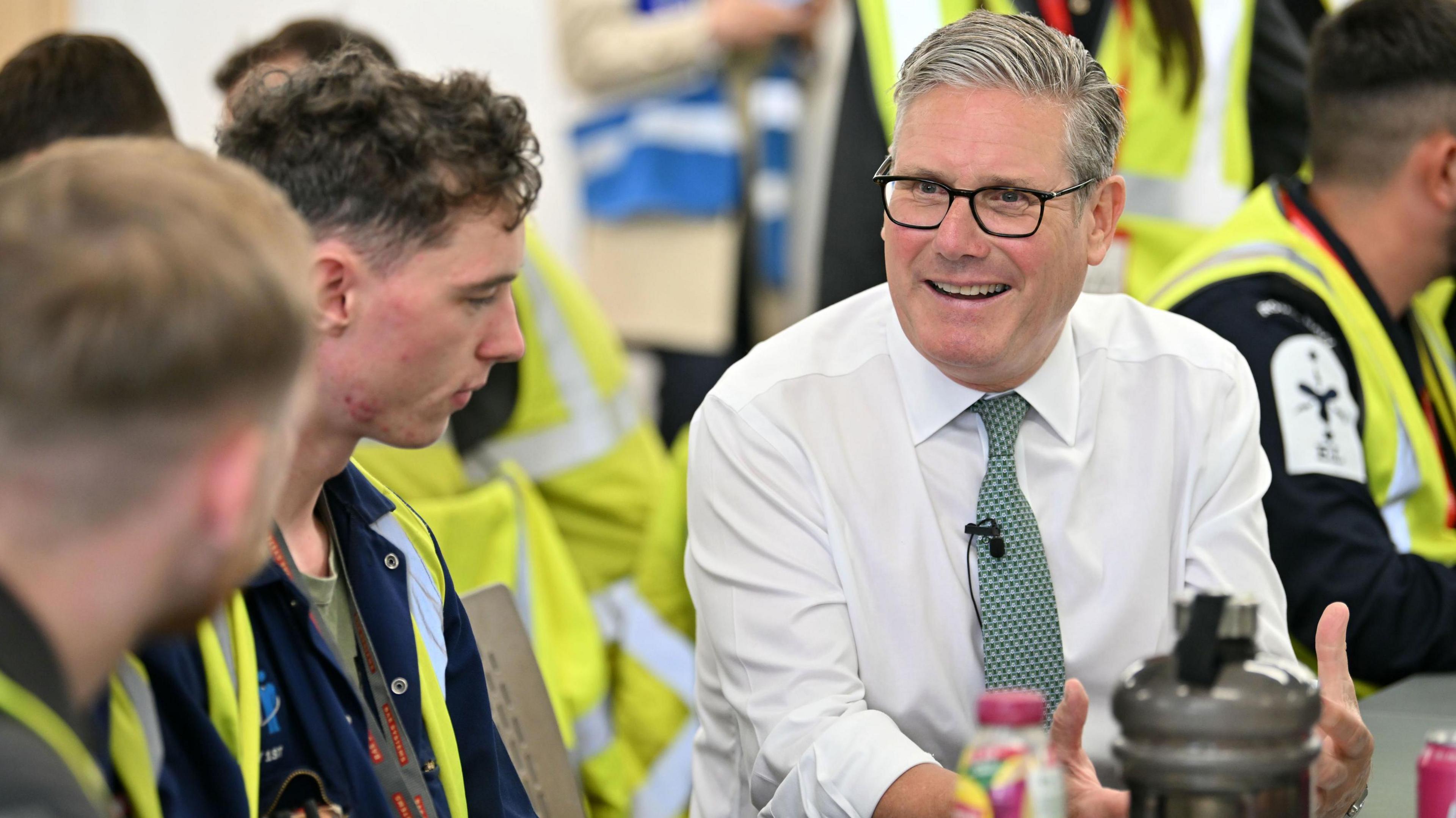 Prime Minister Sir Keir Starmer speaks to ship builders during his visit to BAE Scotstoun shipyard in Glasgow
