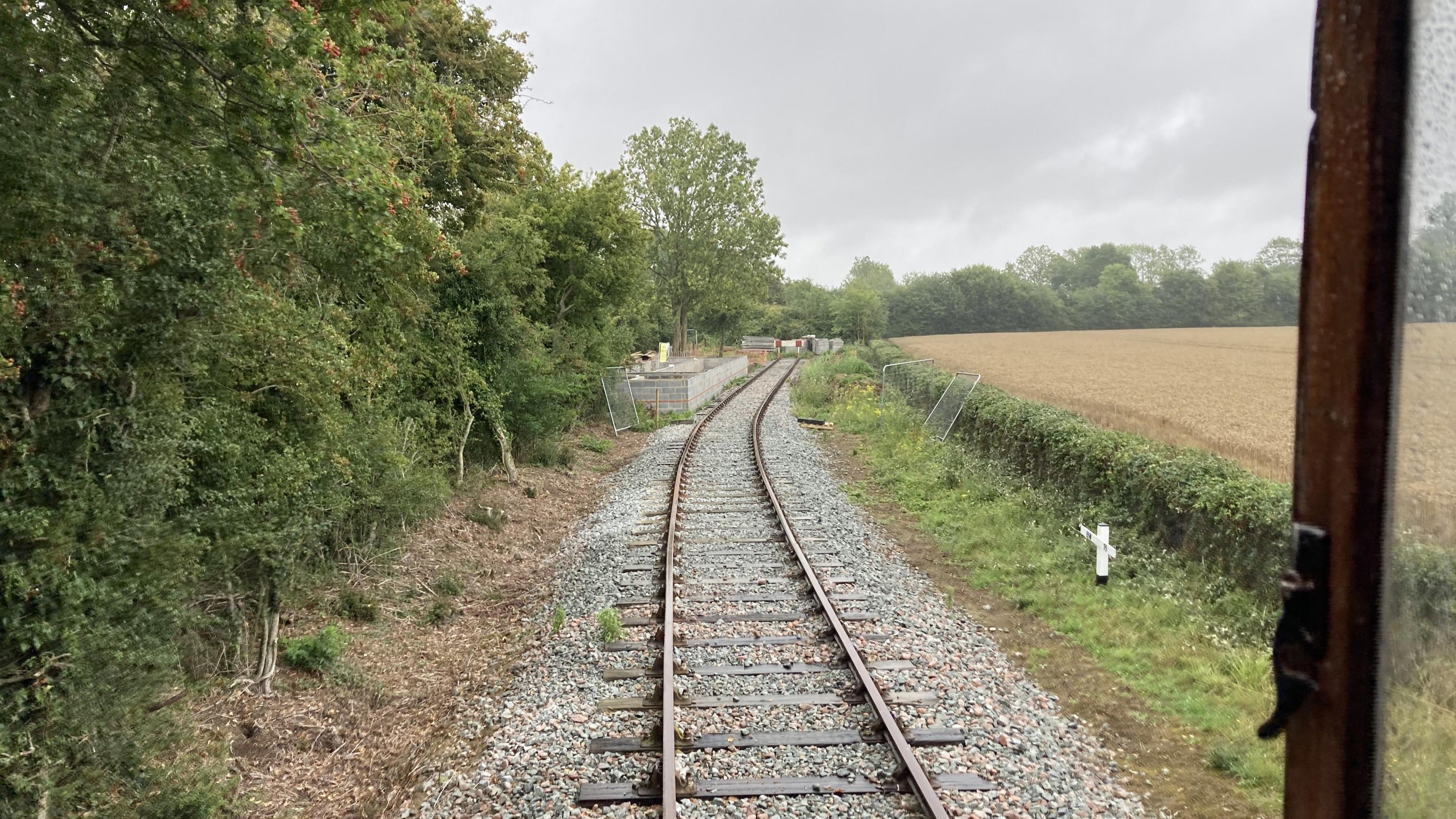 A view of the train track line at Mid-Suffolk Light Railway. A blockade can be seen in the distance at the end of the line.