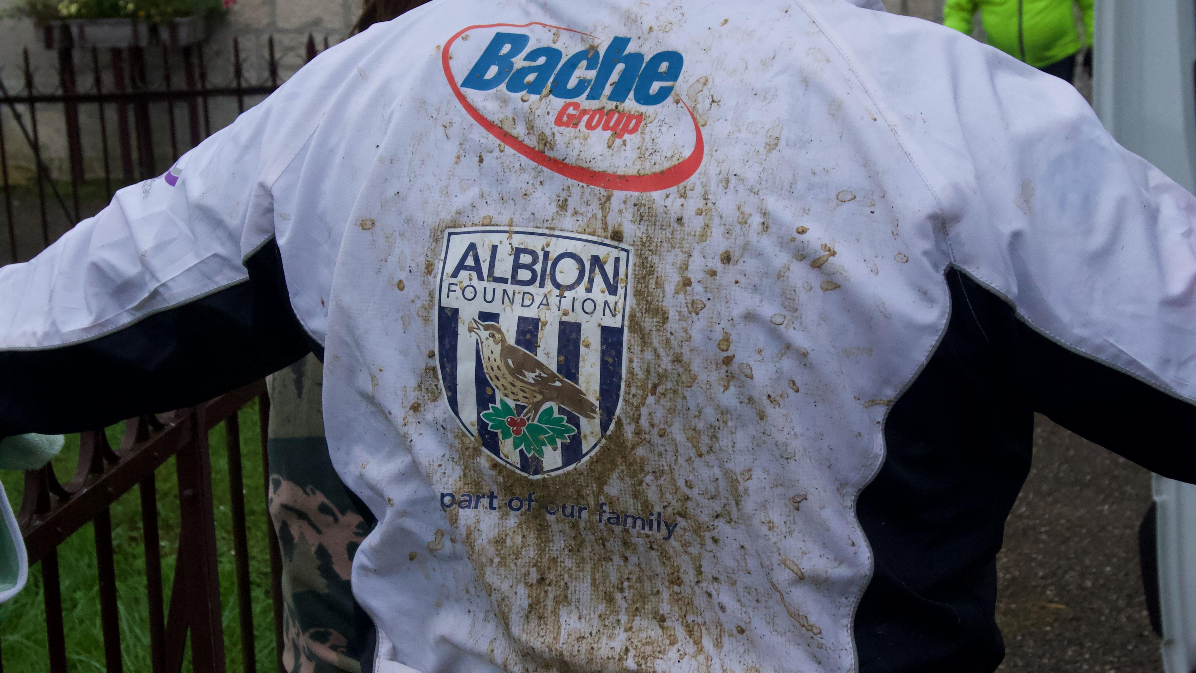 A cycling shirt covered in mud