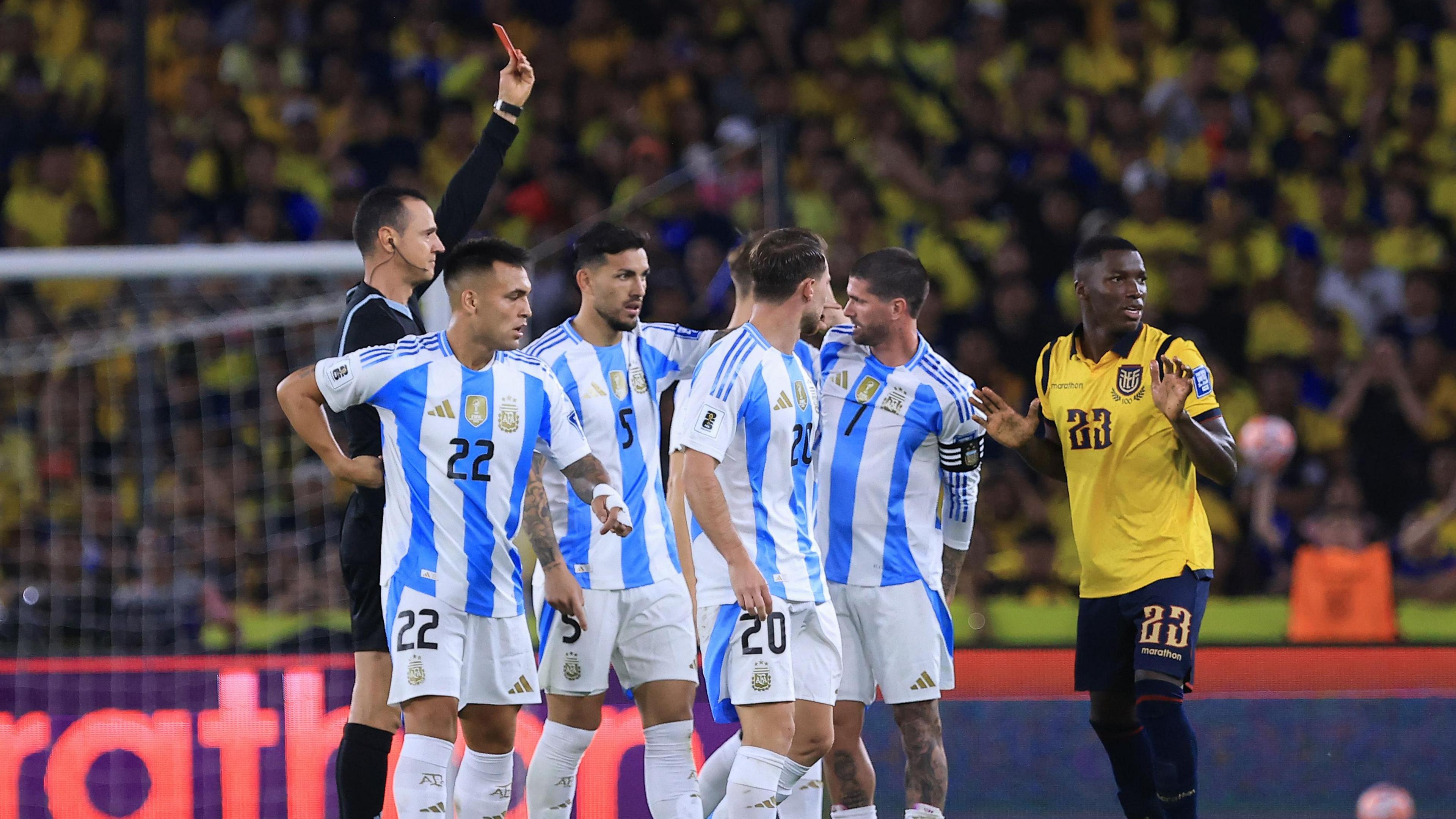 Moises Caicedo receives reddish paper during World Cup qualifying lucifer against Argentina