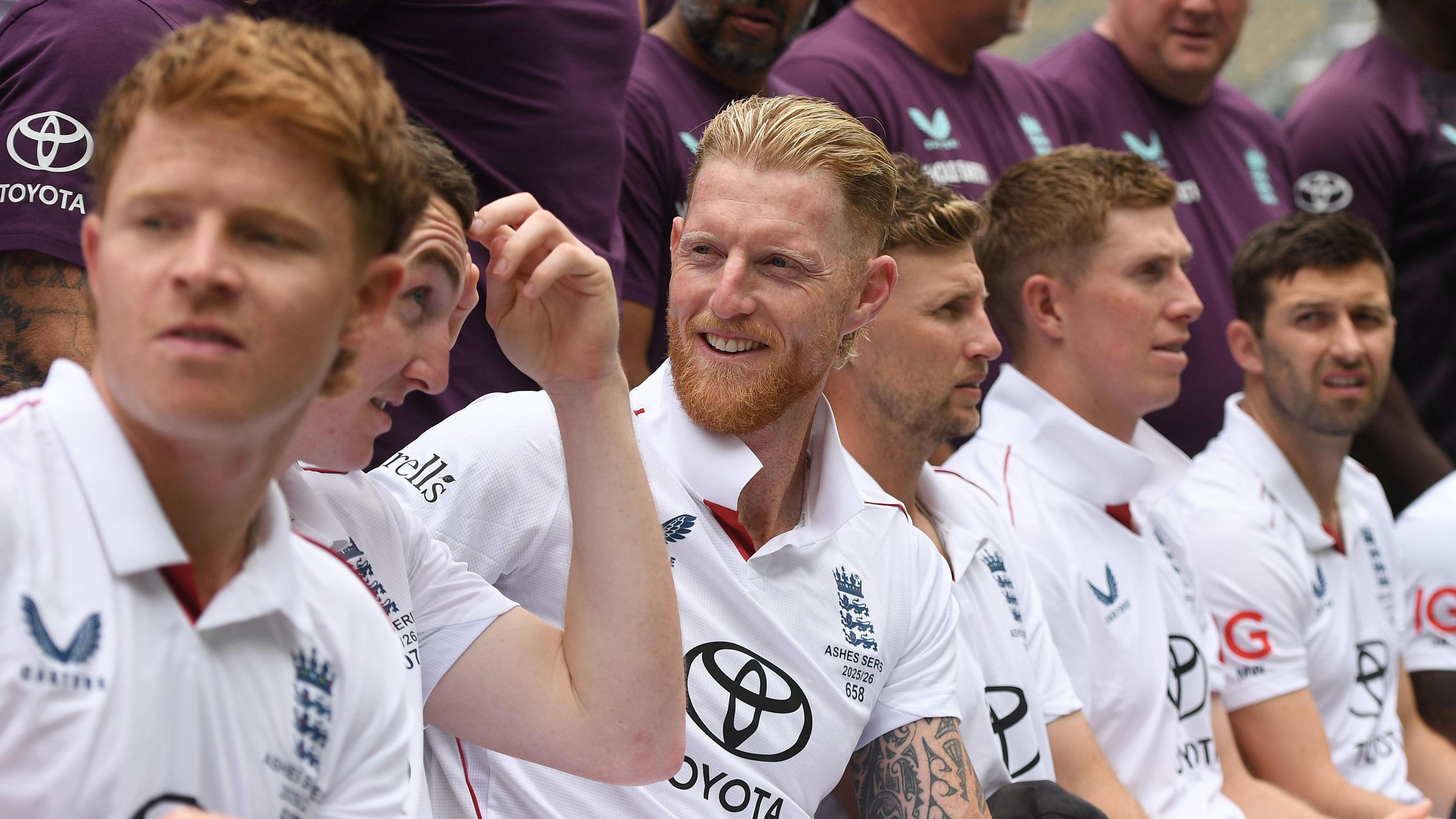 Ben Stokes, Joe Root, Harry Brook, Ollie Pope, Zak Crawley and Mark Wood chat during an England team photo