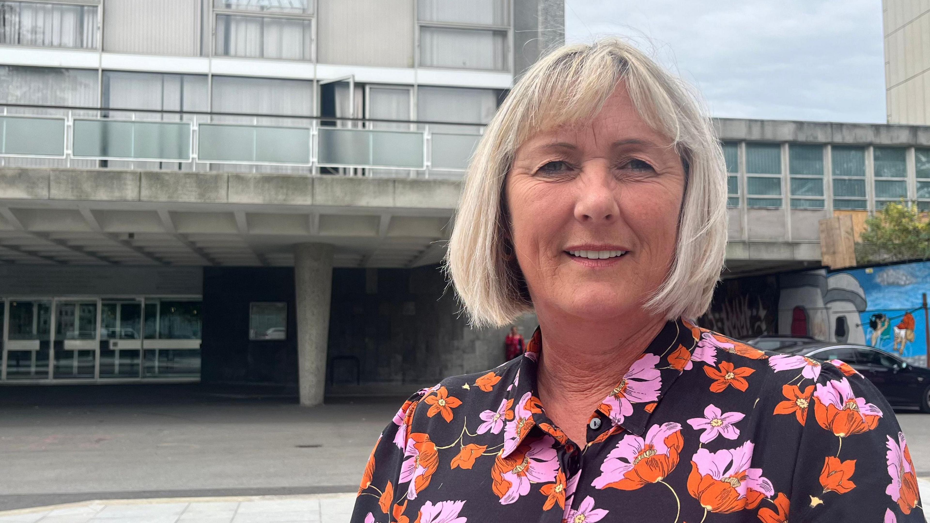 Sally Haydon, cabinet member for community safety at Plymouth City Council. She is wearing a flowery dress.