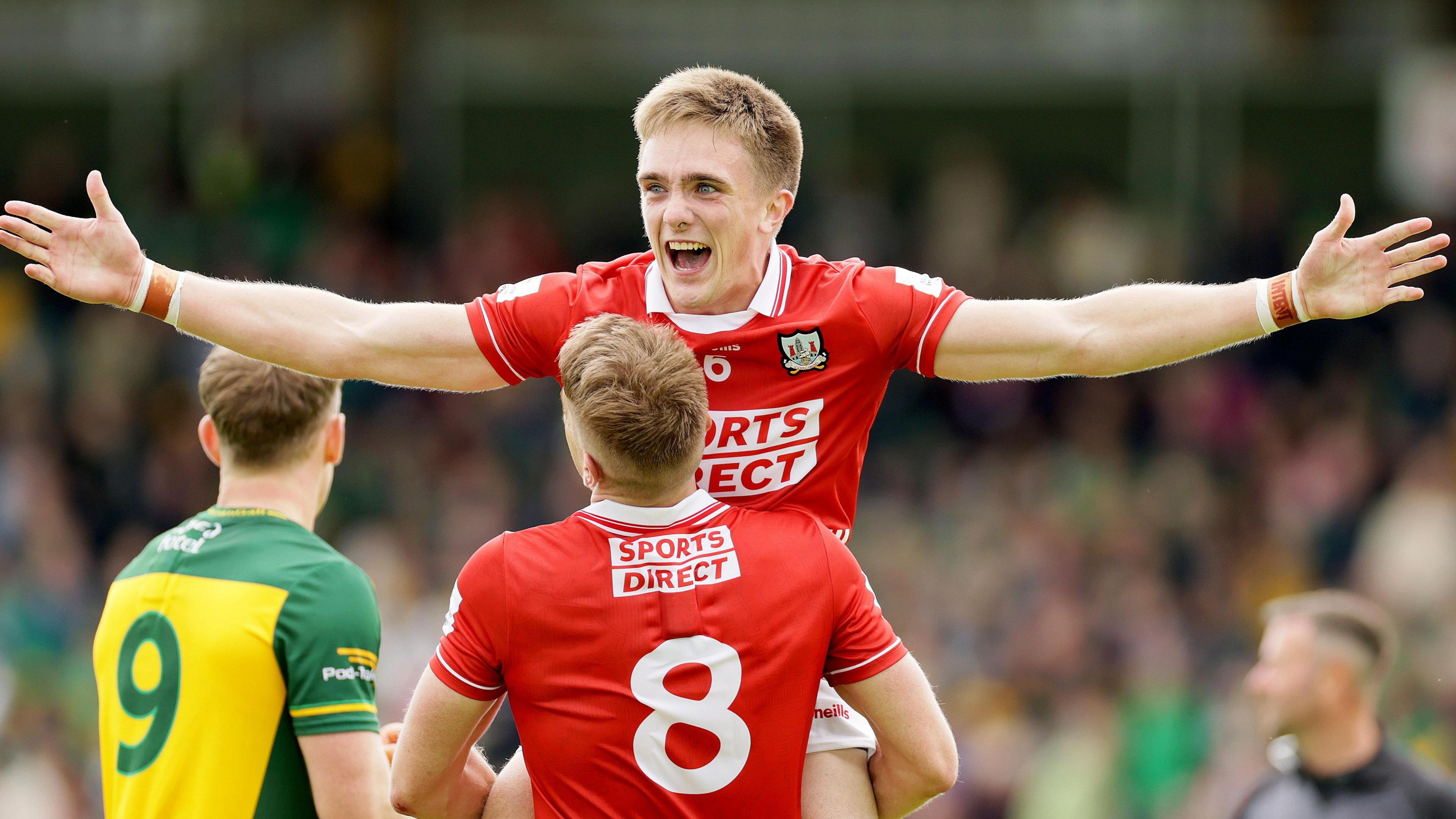Tommy Walsh and Ian Maguire celebrate at full-time