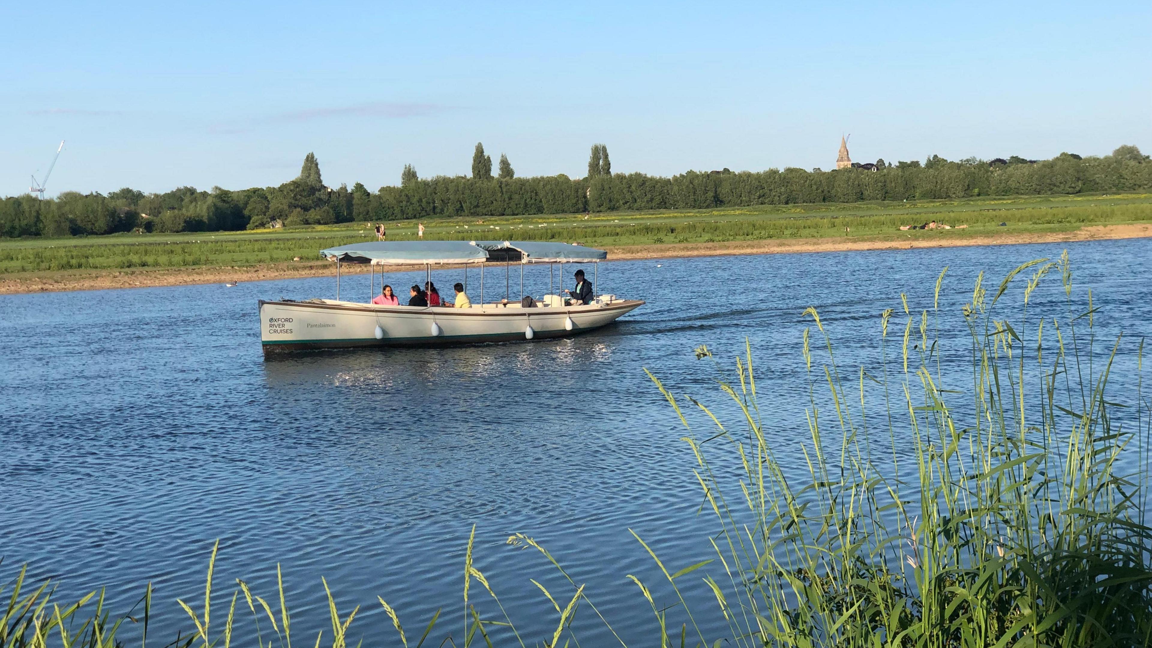 TUESDAY - A sightseeing boat on the river at Summertown