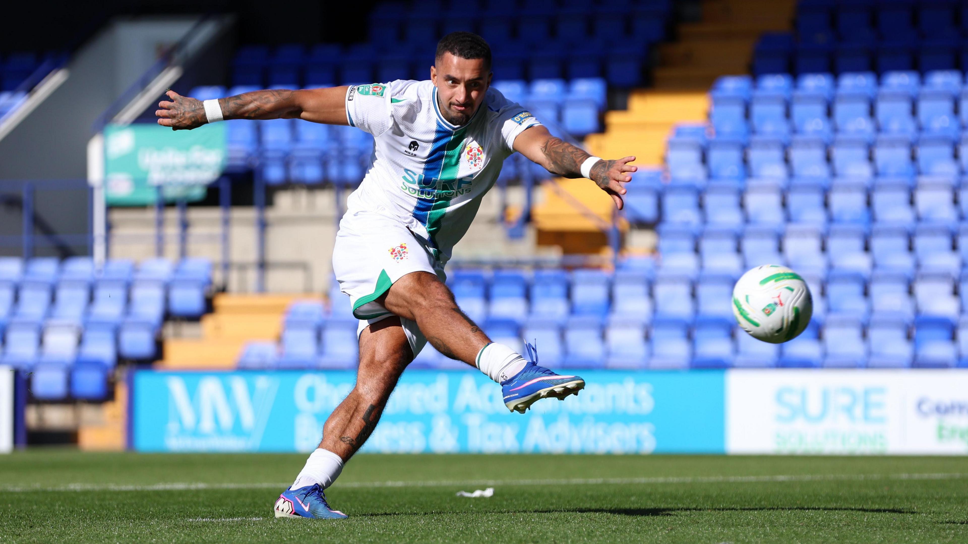 Courtney Baker-Richardson taking a penalty for Tranmere
