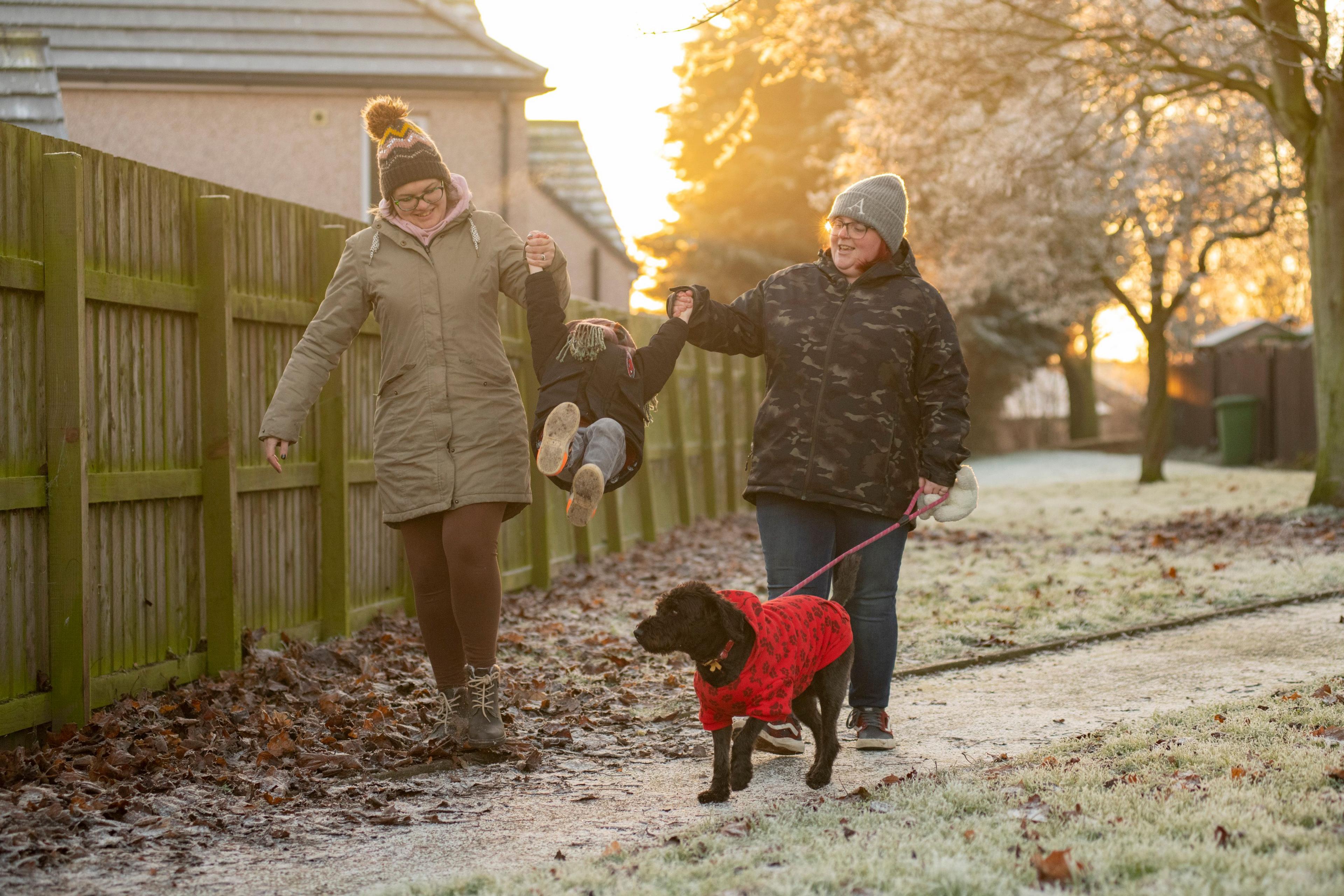 Kirstie and Amy with their son and dog Poppy